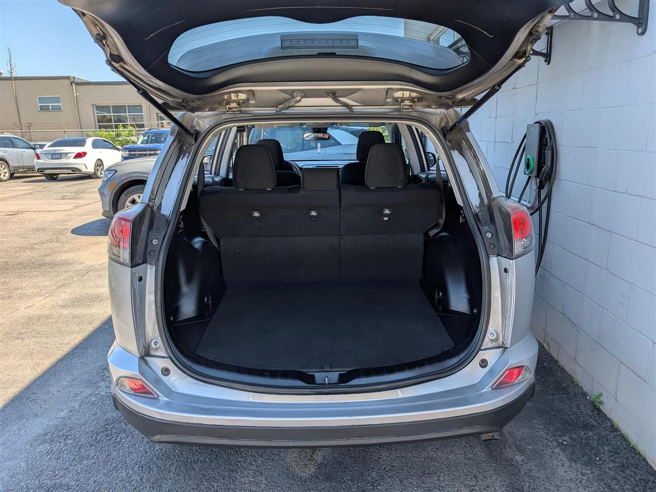 2018 Toyota RAV4 LE - HTD SEATS - REV CAM - TECH FEATS Photo