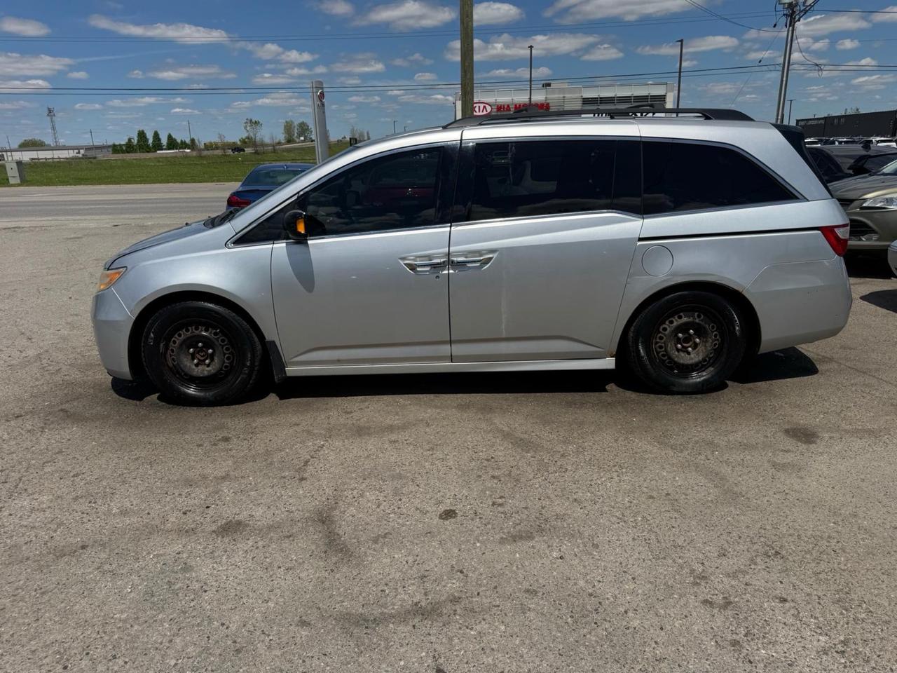 2012 Honda Odyssey AS IS, Touring, POWER STEERING ISSUE, RUNS GOOD Photo