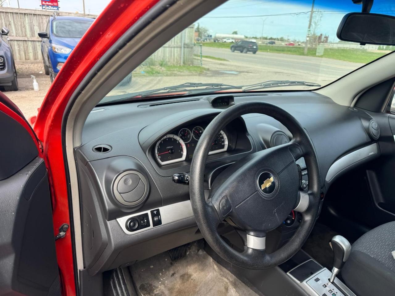2009 Chevrolet Aveo AS IS, LT, DRIVES GREAT, LIGHT FRONT END DAMAGE Photo