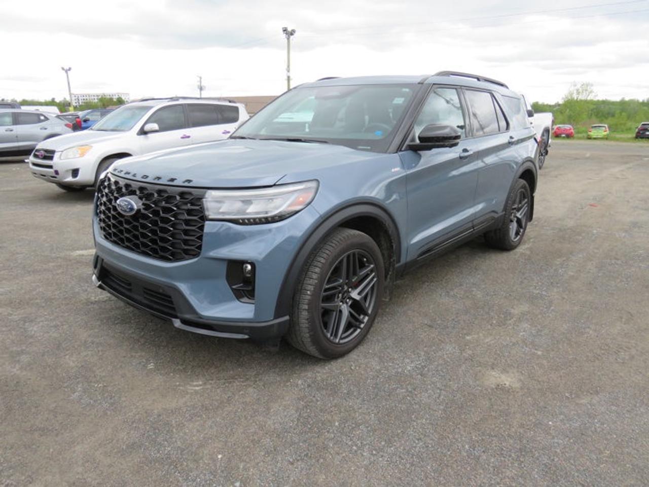 New Price!Vapor Blue 2025 Ford Explorer ST-Line 4WD 10-Speed Automatic 2.3L EcoBoost I-44WD, 10 Speakers, 3.58 Non-Limited Slip Rear Axle, 3rd row seats: bench, 4-Wheel Disc Brakes, ABS brakes, Air Conditioning, Alloy wheels, AM/FM radio: SiriusXM with 360L, Apple CarPlay/Android Auto, Auto High-beam Headlights, Automatic temperature control, Brake assist, Bumpers: body-colour, Compass, Delay-off headlights, Driver door bin, Driver vanity mirror, Dual front impact airbags, Dual front side impact airbags, Electronic Stability Control, Emergency communication system: 911 Assist, Exterior Parking Camera Rear, Four wheel independent suspension, Front anti-roll bar, Front Bucket Seats, Front dual zone A/C, Front fog lights, Front reading lights, Fully automatic headlights, Garage door transmitter, Heated door mirrors, Heated front seats, Heated steering wheel, Heated Unique Cloth Captains Chairs, Illuminated entry, Internet access capable: FordPass Connect 5G, Knee airbag, Leather steering wheel, Low tire pressure warning, Navigation System, Occupant sensing airbag, Outside temperature display, Overhead airbag, Overhead console, Panic alarm, Passenger door bin, Passenger vanity mirror, Power door mirrors, Power driver seat, Power Liftgate, Power passenger seat, Power steering, Power windows, Radio: B&O Sound System by Bang & Olufsen, Rear air conditioning, Rear anti-roll bar, Rear reading lights, Rear window defroster, Rear window wiper, Remote keyless entry, Security system, Speed control, Speed-sensing steering, Speed-Sensitive Wipers, Split folding rear seat, Spoiler, Steering wheel mounted audio controls, Tachometer, Telescoping steering wheel, Tilt steering wheel, Traction control, Trip computer, Variably intermittent wipers, Wheels: 20 Ebony-Painted Machined Aluminum.Certification Program Details: 80 Point Inspection Fresh Oil Change Full Vehicle Detail Full tank of Gas 2 Years Fresh MVI Brake through InspectionAt Steele GMC Buick Fredericton, were proud to be your Used Car Mega Center serving drivers all across Atlantic Canada from Fredericton, Oromocto, New Maryland, Woodstock, Saint John, and Moncton in New Brunswick, to Nova Scotia, Prince Edward Island, and Newfoundland. Our inventory features all makes and models of used cars, trucks, SUVs, and vans, giving you the best selection in the region. Whether you need a fuel-efficient sedan, a family SUV, or a rugged pickup, youll find it right here at Steele GMC Buick Fredericton. With our Market Value Pricing, every vehicle is priced based on real-time market conditions, ensuring you get the best possible deal without the hassle of negotiating. We keep pricing transparent and competitive so you can shop with total confidence. No matter your credit situation good, bad, or no credit at all youre approved. Our finance experts work with lenders across Atlantic Canada to find the best terms for your budget, including second-chance financing, newcomer programs, and credit rebuilding solutions. As part of Steele Auto Group, Atlantic Canadas most diversified automotive group with 47 dealerships representing 27 brands, we offer unmatched selection, buying power, and customer support. That means if the vehicle you want isnt on our Fredericton lot, we can source it quickly from our massive dealer network across the Maritimes. When it comes to used vehicles, Steele GMC Buick Fredericton is the destination for drivers all across Atlantic Canada delivering market value pricing, every make and model, and guaranteed credit approval so you can get on the road with confidence.Steele Auto Group is the most diversified group of automobile dealerships in Atlantic Canada, with 47 dealerships selling 27 brands and an employee base of well over 2300.