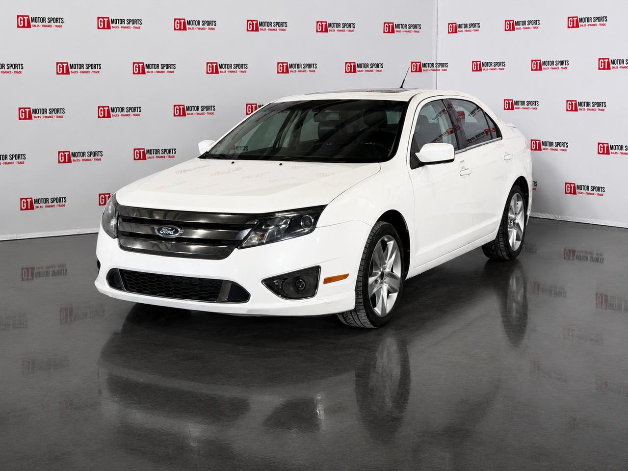 This 2011 Ford Fusion Sport AWD gives you that confident, comfortable feeling every time you drive, with a sporty look that still feels sharp and enjoyable. With leather seating and all-wheel drive, it feels like a solid, practical car thats ready for daily driving in every season.<div></div><div><br></div><div><ul><li>All credit accepted: good, bad, new to Canada, bankruptcy, collections, repossessions, student/work visas</li><li>In-house financing available (O.A.C.)</li><li>Low bi-weekly payments & instant approvals</li><li>Up to 6 months no payments (interest accrues)</li><li>Credit consolidation, unemployment insurance, negative equity coverage</li><li>Financing, APR & payments vary by personal credit (O.A.C.)</li></ul></div><div><b><br></b></div><div><b>Open 7 days:</b> MonThu 107, FriSat 106, Sun 103</div><div><b>Location: </b>10-40 Hopewell Way NE, Calgary (behind Enterprise Car Rental)</div><div><b>Contact:</b> 403-402-2015 or www.gtmotorsports.ca</div><div>Full mechanical fitness assessment, Carfax & warranty included</div><div>AMVIC licensed dealer</div><div>Price based on vehicle only (Plus aftermarket, GST, and costs/charges associated with financing)</div><div><br></div><div></div>