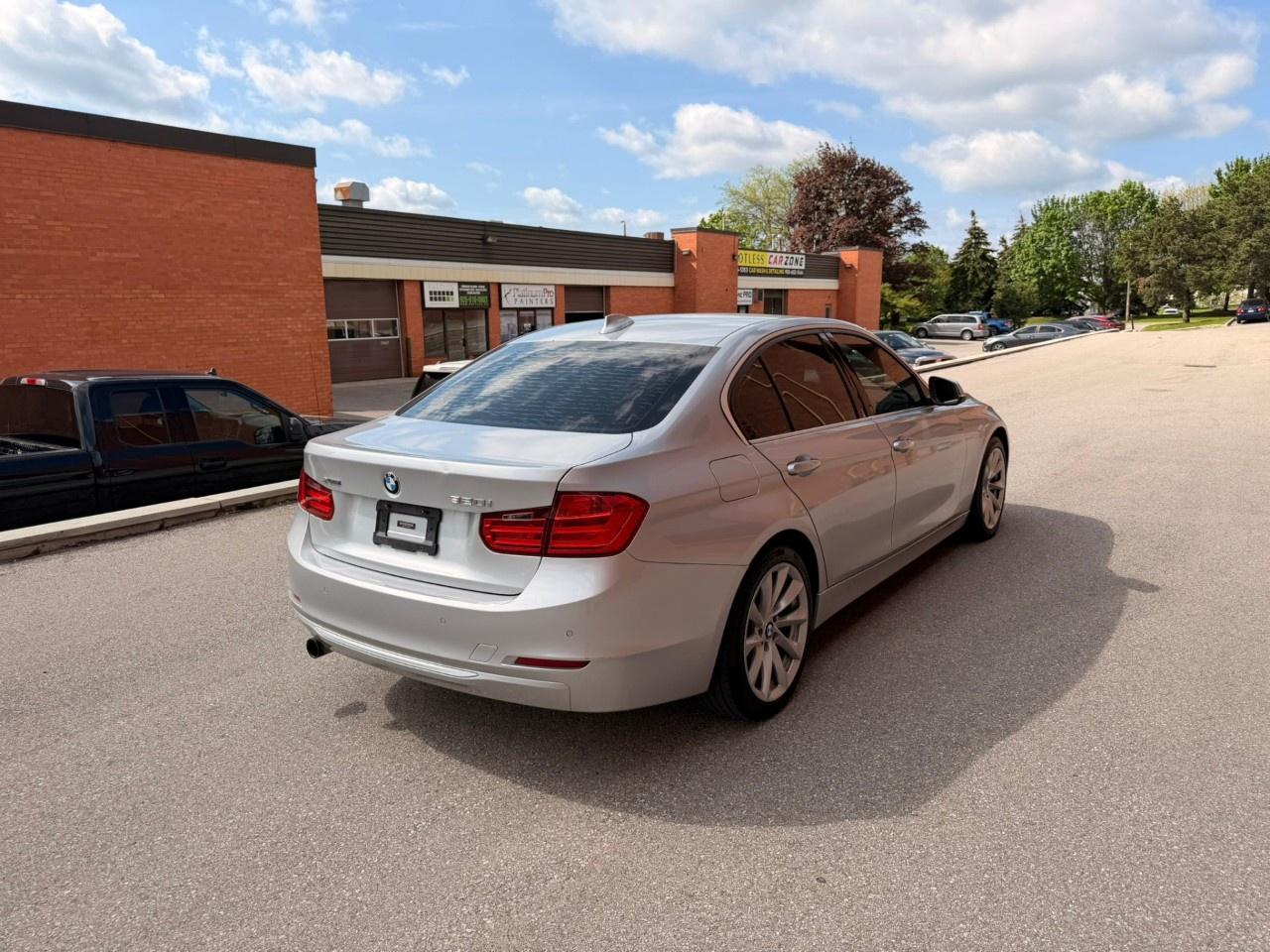 2014 BMW 3 Series 4dr Sdn 320i xDrive AWD Photo4