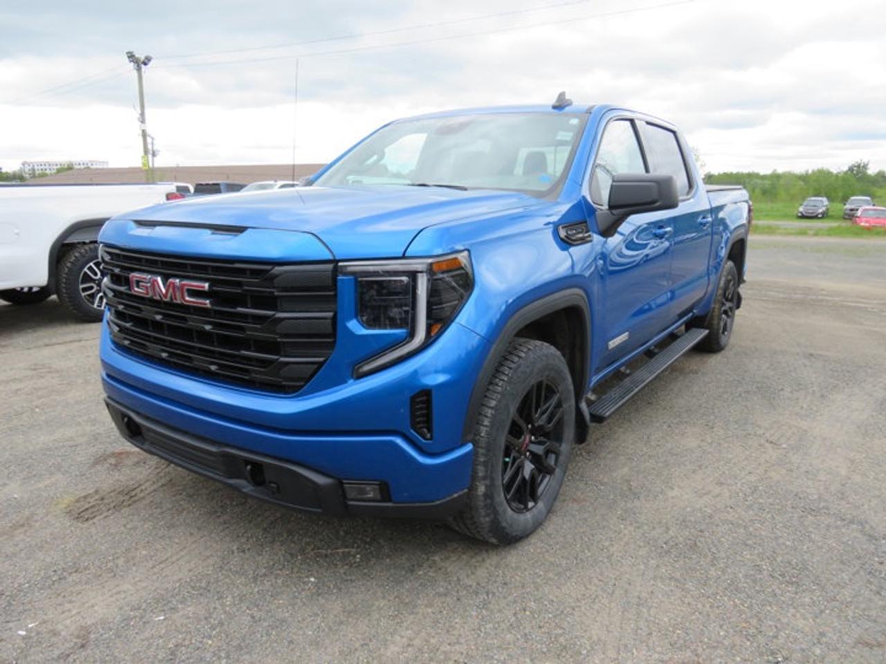 New Price!Blue Metallic 2024 GMC Sierra 1500 Elevation 4WD 10-Speed Automatic EcoTec3 5.3L V810-Speed Automatic, 4WD, Black Cloth, 10-Way Power Driver Seat Adjuster w/Lumbar, 120-Volt Bed Mounted Power Outlet, 120-Volt Interior Power Outlet, 170 Amp Alternator, 2 Charge-Only Rear USB Ports, 2 Charge/Data USB Ports, 220 Amp Alternator, 4-Way Manual Passenger Seat Adjuster, 4-Wheel Disc Brakes, 6 Speakers, 6-Speaker Audio System Feature, ABS brakes, Air Conditioning, All-Weather Floor Liner (LPO), Alloy wheels, AM/FM radio: SiriusXM with 360L, Apple CarPlay/Android Auto, Auto High-beam Headlights, Auto-Locking Rear Differential, Automatic Emergency Braking, Automatic temperature control, Auxiliary External Transmission Oil Cooler, Body Colour Header w/Gloss Black Mesh Grille Bars, Brake assist, Buckle to Drive, Bumpers: body-colour, Cloth Rear Seat w/Storage Package, Cloth Seat Trim, Colour-Keyed Carpeting Floor Covering, Compass, Deep-Tinted Glass, Delay-off headlights, Driver door bin, Driver vanity mirror, Dual Exhaust System, Dual front impact airbags, Dual front side impact airbags, Electric Rear-Window Defogger, Electronic Stability Control, Engine Block Heater, External Engine Oil Cooling, Following Distance Indicator, Forward Collision Alert, Front 40/20/40 Split-Bench Seat, Front anti-roll bar, Front dual zone A/C, Front fog lights, Front Frame-Mounted Black Recovery Hooks, Front Pedestrian Braking, Front reading lights, Front Rubberized-Vinyl Floor Mats, Front wheel independent suspension, Fully automatic headlights, GMC Connected Access Capable, HD Rear Vision Camera, Heated door mirrors, Heated Driver & Front Outboard Passenger Seating, Heated front seats, Heated steering wheel, Heavy-Duty Air Filter, High Capacity Suspension Package, Hill Descent Control, Hitch Guidance, Illuminated entry, Integrated Trailer Brake Controller, IntelliBeam Automatic High Beam On/Off, Keyless Open & Start, Lane Keep Assist w/Lane Departure Warning, LED Cargo Area Lighting, Low tire pressure warning, Manual Tilt-Wheel & Telescoping Steering Column, Navigation System, Not Equipped w/Steering Column Lock, Occupant sensing airbag, Off-Road Suspension, OnStar & GMC Connected Services Capable, Outside temperature display, Overhead airbag, Overhead console, Panic alarm, Passenger door bin, Passenger vanity mirror, Power Door Locks, Power door mirrors, Power driver seat, Power Front Windows w/Driver Express Up/Down, Power Front Windows w/Passenger Express Down, Power Rear Windows w/Express Down, Power steering, Power windows, Preferred Equipment Group 3SB, Premium audio system: Premium GMC Infotainment System, Push Button Start, Radio data system, Radio: Premium GMC Infotainment Audio System, Rear reading lights, Rear Rubberized-Vinyl Floor Mats, Rear step bumper, Rear Wheelhouse Liners, Rear window defroster, Remote keyless entry, Remote Vehicle Starter System, Security system, SiriusXM w/360L, Speed control, Speed-sensing steering, Split folding rear seat, Spray-On Pickup Bedliner w/GMC Logo, Standard Tailgate, Steering Wheel Audio Controls, Steering wheel mounted audio controls, Tachometer, Telescoping steering wheel, Theft Deterrent System (Unauthorized Entry), Tilt steering wheel, Traction control, Trailering Package, Trip computer, Variably intermittent wipers, Voltmeter, Wheels: 20 x 9 High Gloss Black Painted Aluminum, Wi-Fi Hotspot Capable, Wireless Apple CarPlay/Wireless Android Auto, X31 Hard Badge, X31 Off-Road & Protection Package, X31 Off-Road Package.At Steele GMC Buick Fredericton, were proud to be your Used Car Mega Center serving drivers all across Atlantic Canada from Fredericton, Oromocto, New Maryland, Woodstock, Saint John, and Moncton in New Brunswick, to Nova Scotia, Prince Edward Island, and Newfoundland. Our inventory features all makes and models of used cars, trucks, SUVs, and vans, giving you the best selection in the region. Whether you need a fuel-efficient sedan, a family