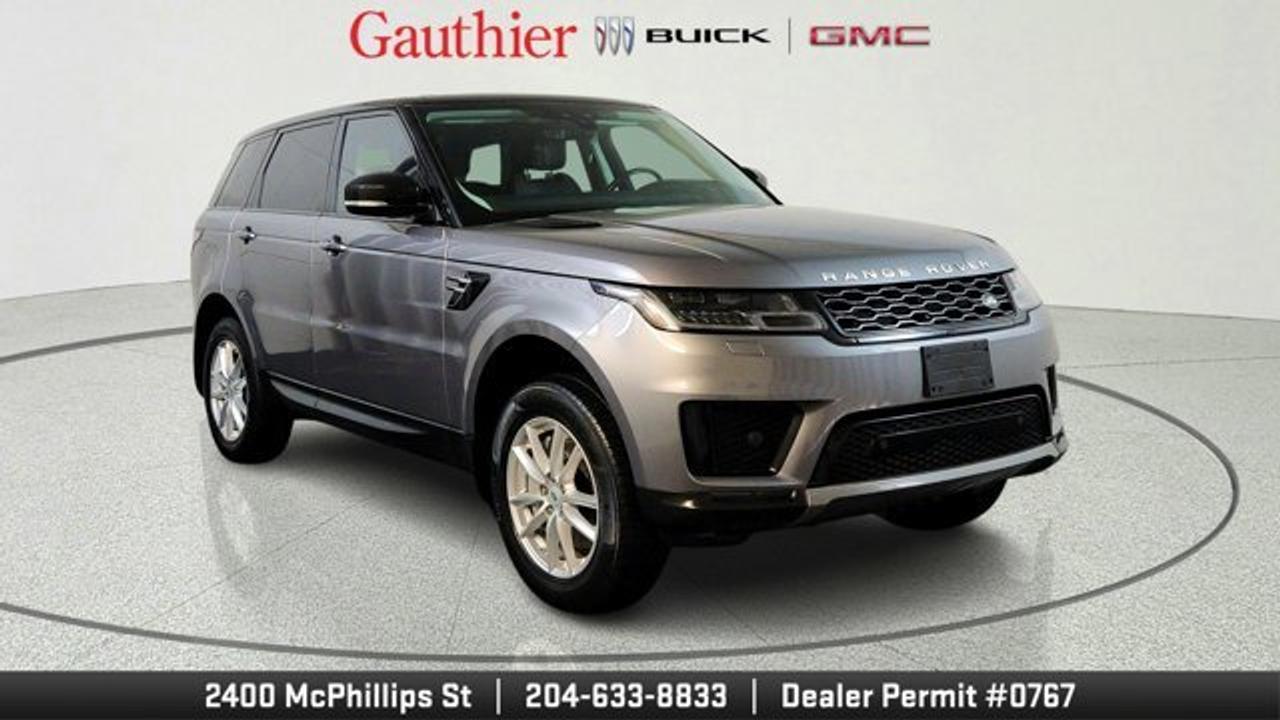 The 2021 Range Rover Sport is engineered to impress, featuring a dynamic 3.0L turbocharged engine paired with an electric motor for a refined driving experience. Its sophisticated air suspension system ensures that every bump in the road is smoothed out, providing a ride quality that is truly first-class. Whether you are navigating busy local streets or cruising on the highway, the full-time all-wheel drive provides confidence and control in various weather conditions.<br />Inside, you will find a cabin designed for ultimate passenger comfort. The interior features grained leather seating with heated front and rear seats, ensuring everyone stays cozy during the cooler months. Technology is at your fingertips with a premium navigation system, smartphone integration, and a clear backup camera, making every journey more convenient. The panoramic roof floods the cabin with natural light, creating an airy and open atmosphere for all passengers.