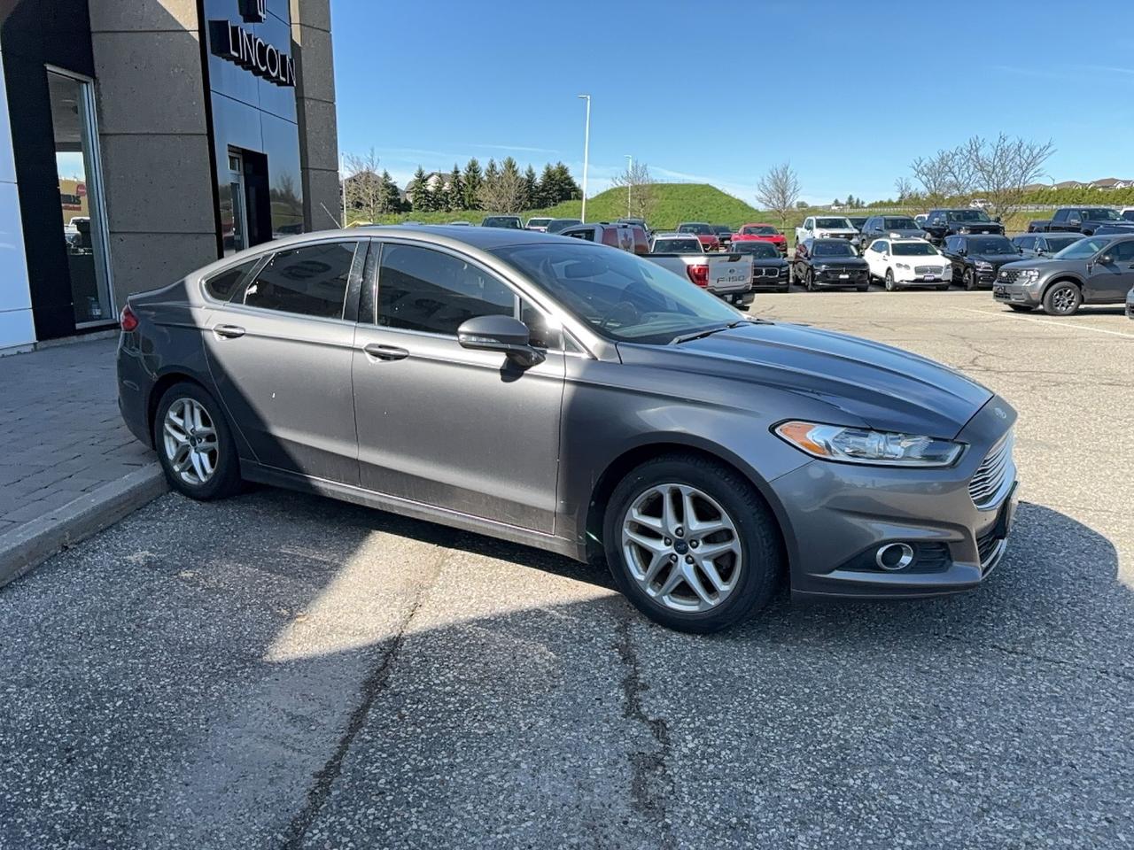 2013 Ford Fusion LOCAL TRADE, LEATHER, 2 SETS OF TIRES, AS TRADED Photo