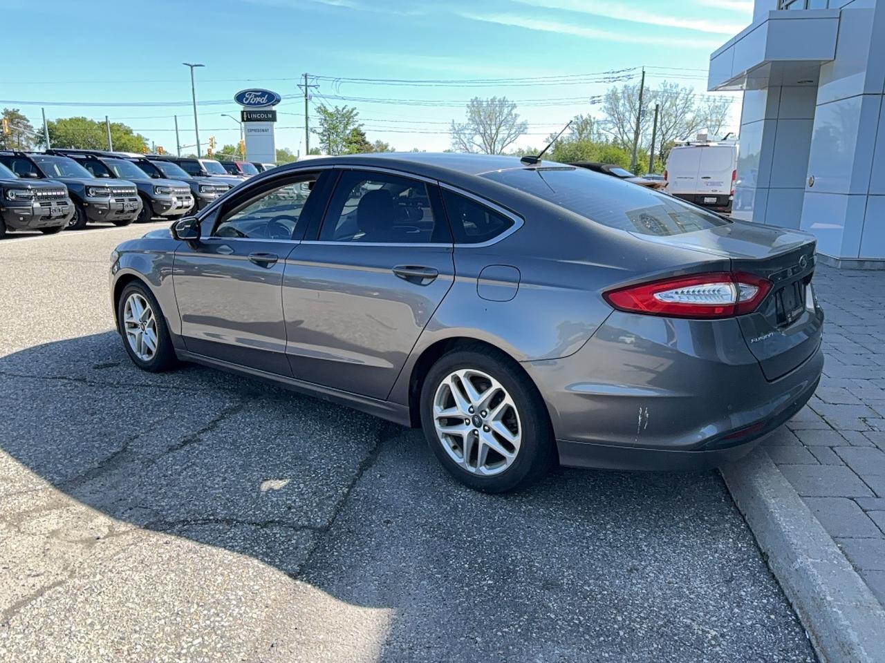 2013 Ford Fusion LOCAL TRADE, LEATHER, 2 SETS OF TIRES, AS TRADED Photo