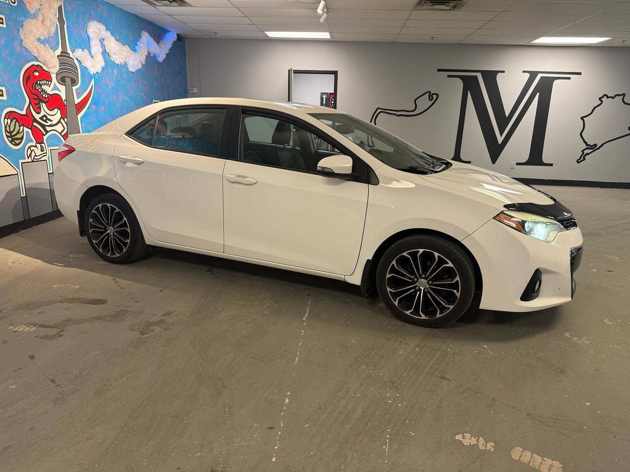 2015 Toyota Corolla 4dr Sdn Man Photo