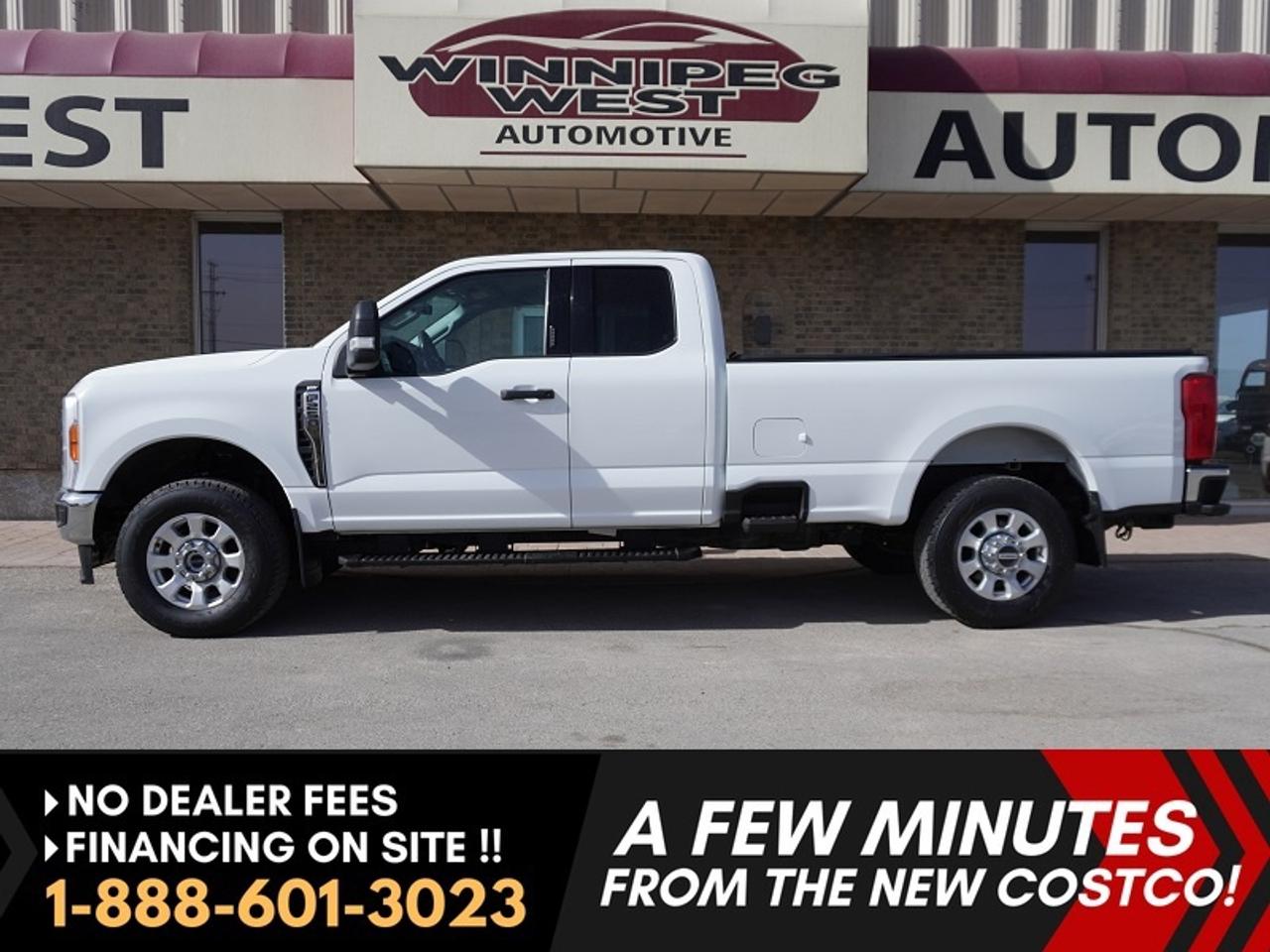 *** Dealer arranged financing on site! Quick, Simple,  no calls or waiting on bank appointments required!! Drive away today ***   NO ADMINISTRATION FEES!! 

Fully Redesigned 2023 Ford F-250 XLT SuperCab 4WD -- LOADED WITH **7.3L GODZILLA V8 ENGINE**  TOW PACKAGE - 10-speed TorqShift automatic transmission --  Rear backup camera -- 8in Ford SYNC Infotainment system with Apple Car and Android Auto --  Satellite Radio  -- Full-length running boards  Tonneau Cover --  Heavy Duty Rhino Bed Liner --  Power Driver Seat -- Box side steps, and corner bumper steps. Also, with this comes the Ford Interior work surface... a very usable and functional Fords central workspace.   Center arm rest folds out to be able to multitask in your truck. A true office on wheels.  

Sharp white exterior. Well-maintained interior. Capacity for up to 6 passengers. Rear-hinged half-door design.

Excellent history. Well serviced. No accidents. Rare hard to come by super cab with a 8ft box.  Not your typical work truck, this has been cared for and maintained the shape inside and out shows this. 


Features
- 10-speed automatic transmission
- 4WD
- 430 hp, 485 lb-ft of torque
- Air Conditioning
- Reverse Camera
- Cruise Control
- Integrated Trailer Brake Controller
- Trailer Sway Control
- 8-in Ford SYNC Infotainment system
- Apple Car and Android Auto
- Sirius XM Capability
- Power Steering
- Vocal Assist Telematics
- Power Windows
- Power Locks
- Power Mirrors
- Traction Control
- Power Seat (Driver)
- 6 Full-Length Running Boards
- Fog Lights
- ABS
- Box Side steps
- Corner Bumper steps
- Multi-spoke aluminum 18 Wheels
- 6.75-foot cargo box
- Tonneau Cover
- Rhino Heavy Duty Bed Liner
- Heated Mirrors
- Towing Mirrors
- Keyless entry
- All-weather heavy-duty factory mats
- USB A and USB C Ports
- Drive mode selector
- Multiple 12-volt (12V) power points
- AC 120V/400W MAX outlet
- 911 Assist
- Valet Mode
- Fords Workspace
- Vehicle hotspot
- Tow hooks


Comes with a Manitoba Safety Certification, and we have many Extended Powertrain warranties available on your vehicle purchase up to 10-year coverage (on eligible vehicles see dealer for details). Financing on site with Zero down financing OAC. Trades accepted. View at Winnipeg West Automotive Group, 5195 Portage Ave. (only a couple of minutes past the new Costco) Dealer permit # 6007, Call now 1(888) 601-3023. This Car is located in Winnipeg Manitoba,  however we can have it shipped anywhere in North America relatively inexpensively.