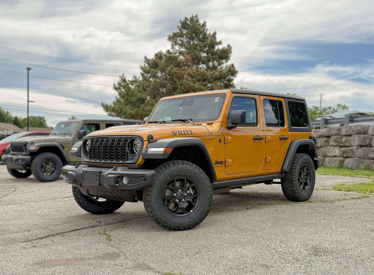 Our New 2026 Jeep Wrangler Willys 4 Door 4X4 featuring the Convenience Package in Goldilocks rides with renowned capability that true adventurers love! Driven by a 3.6 Litre Pentastar V6 supplying 285hp to an 8 Speed Automatic transmission with an Off-Road Plus mode for enhanced trail performance. Dana axles and an electronic locking rear differential help you conquer almost any conditions, and this Four Wheel Drive SUV returns approximately 10.2L/100km on the highway. Eye-catching Willys hood graphics help our Wrangler grab attention with LED lighting, fog lamps, alloy wheels, fender flares, a sport bar, and a fantastic open-air driving experience when you drop the top, fold down the Gorilla Glass windshield, and remove the doors!  The Willys cabin is built for practical comfort with the Convenience Packs heated cloth seats, a heated leather-wrapped steering wheel, remote start, air conditioning, power accessories, pushbutton ignition, auxiliary switches, and 12V power outlets. Uconnect&reg; technology leads the way with a 12.3-inch touchscreen, Apple CarPlay&reg;, Android Auto&reg;, Bluetooth&reg;, an eight-speaker audio system, and an available WiFi hotspot to keep you connected on every drive.  Stay safe as you dominate your days, knowing Jeep has your back with automatic braking, adaptive cruise control, a rearview camera, forward collision warning, trailer sway damping, hill start assistance, and more. The world awaits, and our Wrangler Willys is ready to go! Save this Page and Call for Availability. We Know You Will Enjoy Your Test Drive Towards Ownership!