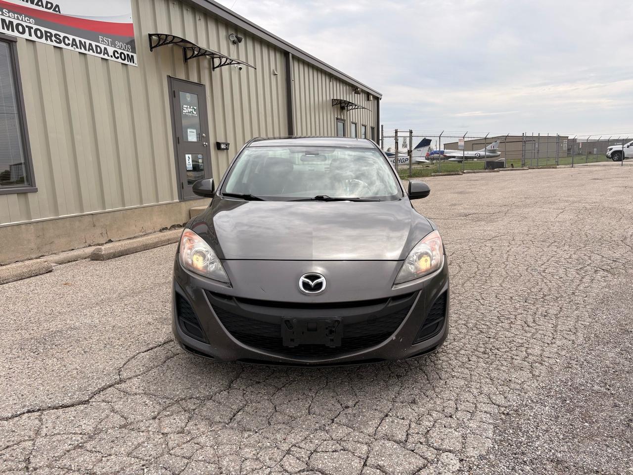 2010 Mazda MAZDA3 4dr Sdn Auto GX Photo