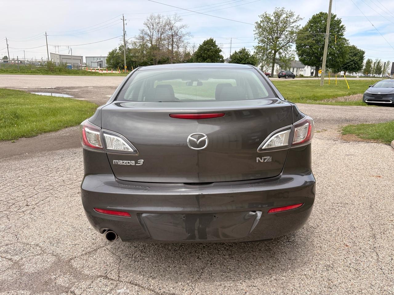 2010 Mazda MAZDA3 4dr Sdn Auto GX Photo