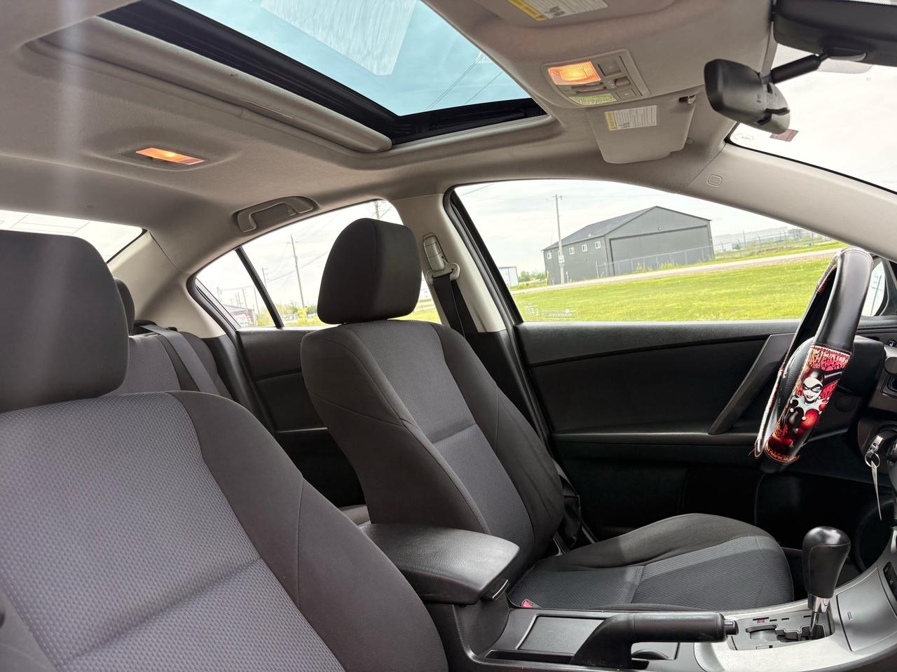 2010 Mazda MAZDA3 4dr Sdn Auto GX Photo