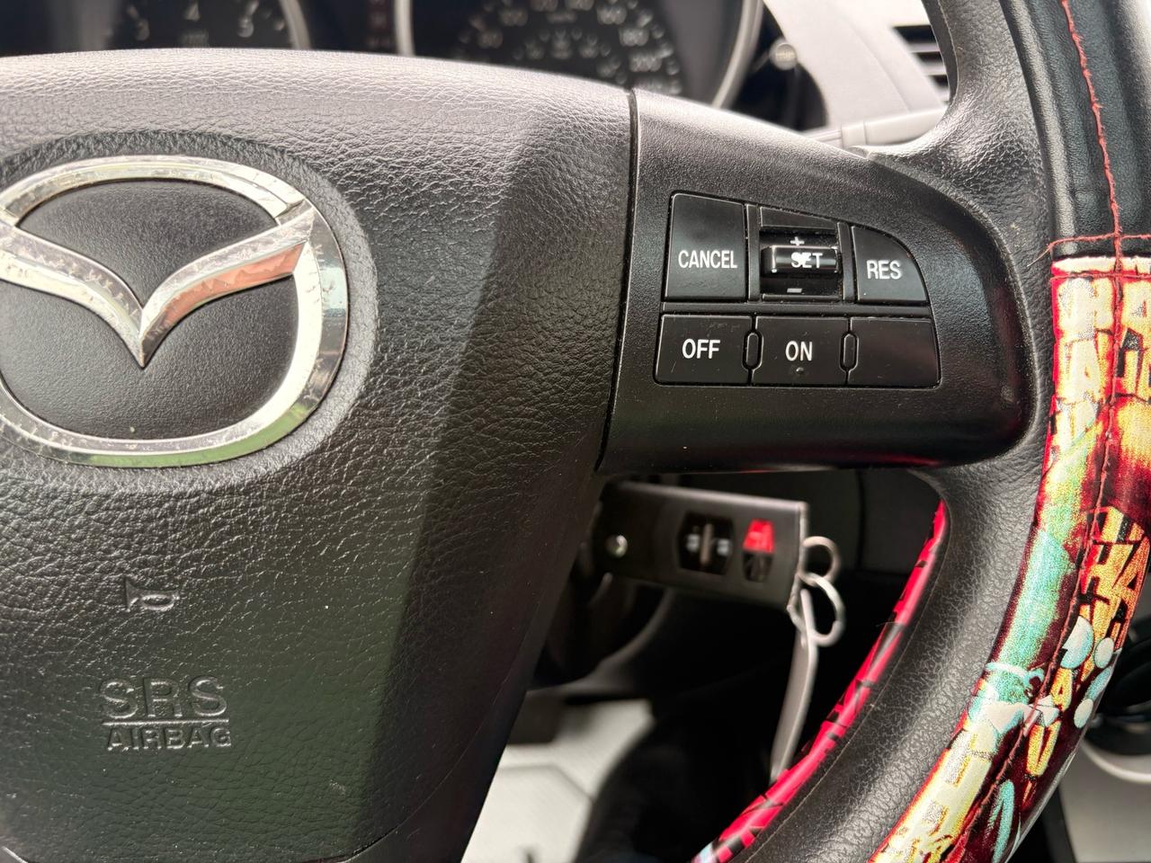 2010 Mazda MAZDA3 4dr Sdn Auto GX Photo