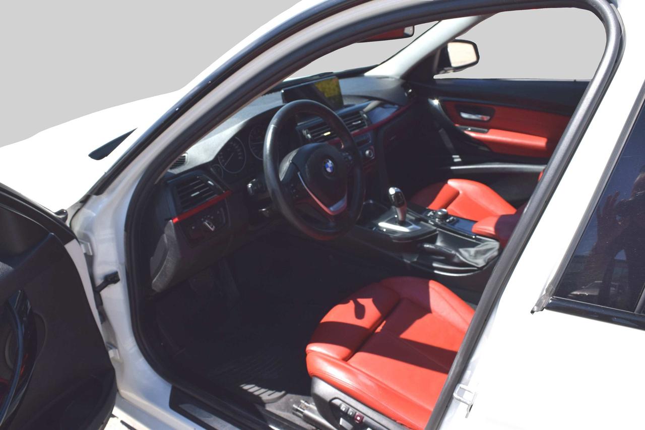 2014 BMW 3 Series 320i xDrive Sport Pkg Photo