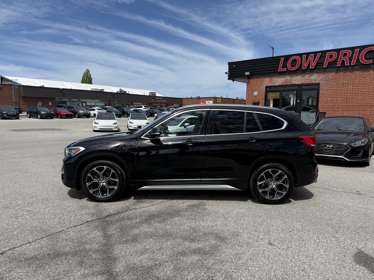 2021 BMW X1 XDrive l 28i l AWD l Auto l Sprts Activity l Navi Photo