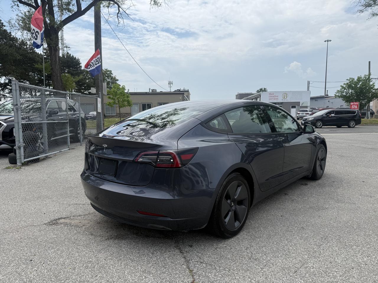 2023 Tesla Model 3 Standard Range l RWD l TeslaWarranty l LFP l Ryzen Photo