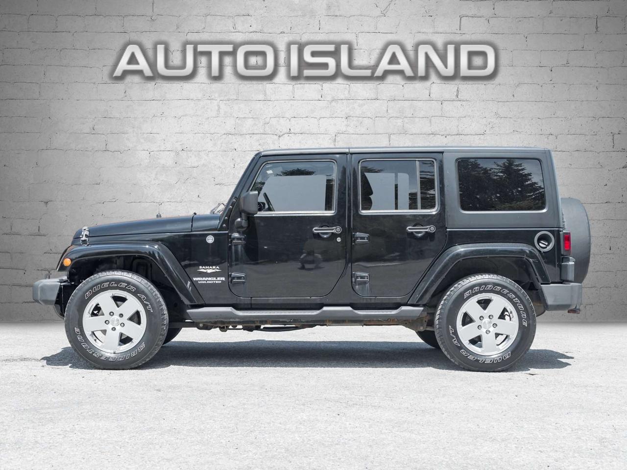 2012 Jeep Wrangler 4WD Sahara, Nav Photo