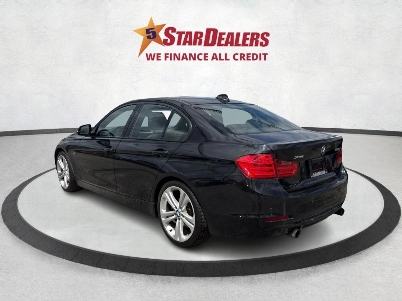 2013 BMW 3 Series 4dr Sdn 335i xDrive AWD Photo