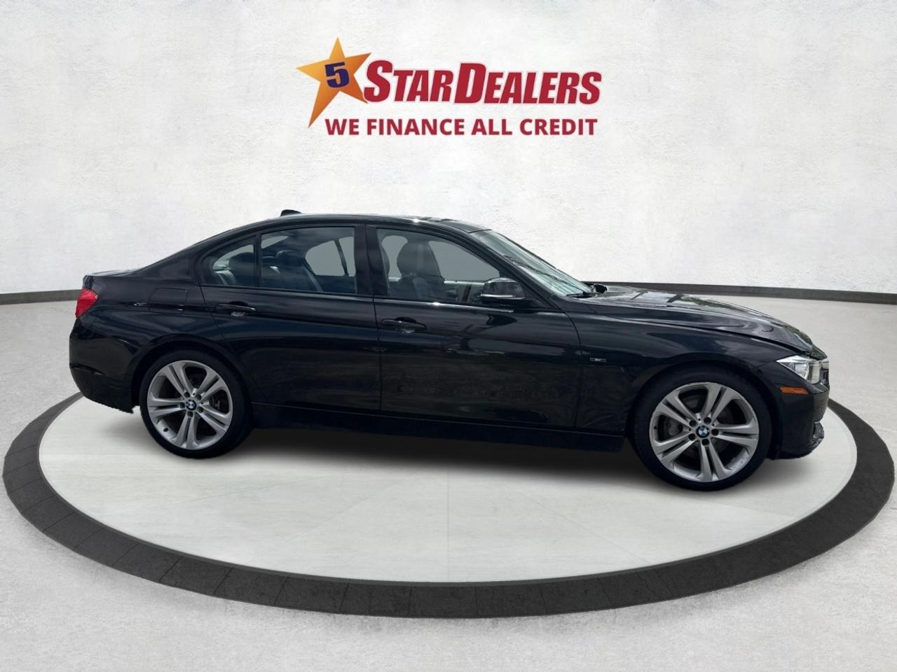 2013 BMW 3 Series 4dr Sdn 335i xDrive AWD Photo