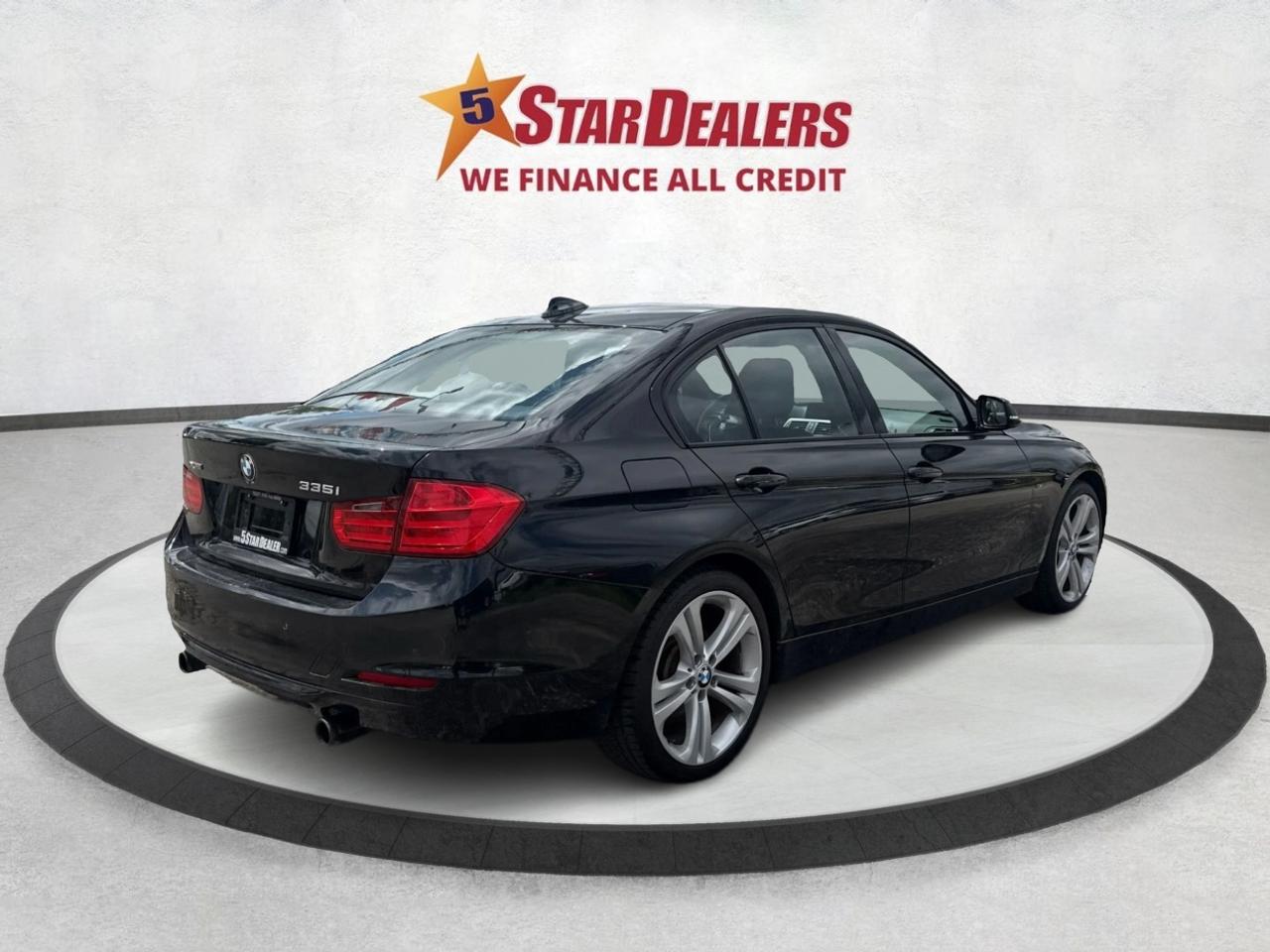 2013 BMW 3 Series 4dr Sdn 335i xDrive AWD Photo