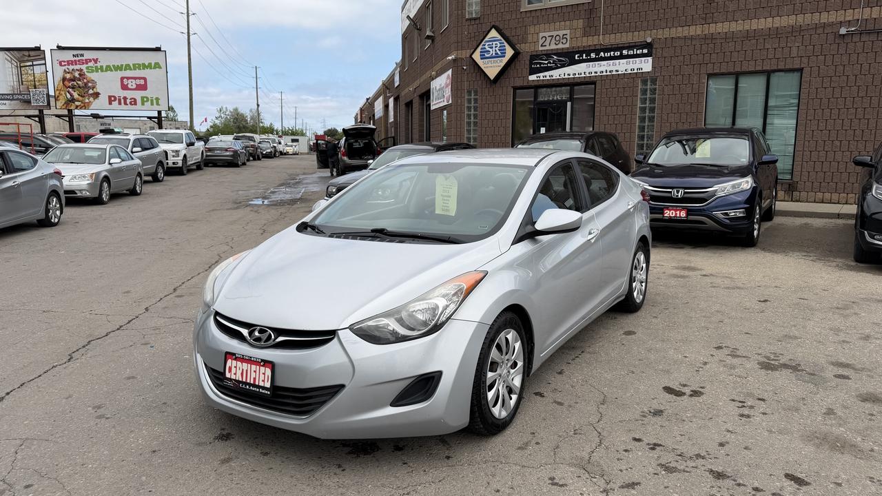 <p class=MsoNormal>This 2013 Hyundai Elantra is a 4-door sedan with an amazing amount of features for your every day needs. With 205061 km on the odometer, this FWD car has a manual transmission and has been well-maintained. AC, power outlets, and Bluetooth capabilities are some of the many features this Elantra offers for you and up to 4 other passengers comfort and convenience. This fully-certified car is an excellent choice for a practical and reliable ride.&nbsp;</p><p class=MsoNormal>Financing is available for all credit types OAC. Carfax provided for every vehicle.</p><p class=MsoNormal>Prices include certification of vehicle, first oil change, and professional detailing; taxes and licensing extra.</p><p class=MsoNormal>3-month warranty included, can be extended for additional cost. Inquire for more details.</p><p class=MsoNormal>Family-run business with friendly staff. Our customers are our number one priority. Satisfaction guaranteed.</p><p>&nbsp;</p><p class=MsoNormal><strong>C.L.S Auto Sales</strong>&nbsp;2795 Barton St. E., Hamilton, ON, L8E 2J8. <br>Office #: 905-561-8030<span style=mso-tab-count: 1;>&nbsp;&nbsp;&nbsp;&nbsp;&nbsp;&nbsp;&nbsp;&nbsp;&nbsp; </span>After-Hours #: 905-517-4507</p>