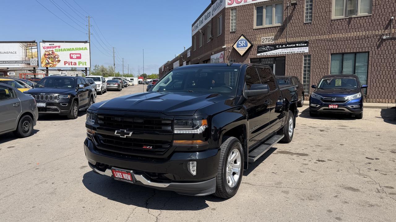 <p class=MsoNormal>This 2016 Chevrolet Silverado is a great truck for all of your intended needs. Dressed in an elegant black, this truck contains a lot of great features such as AC, cruise control, and Bluetooth, all for your comfort and convenience. Seating up to 6 passengers, there is a lot of room and additional space for storage located in the truck bed, allowing you to pack up the vehicle for any type of trip. This fully-certified Silverado is a practical, reliable, and an excellent choice.&nbsp;</p><p class=MsoNormal>Financing is available for all credit types OAC. Carfax provided for every vehicle.</p><p class=MsoNormal>Prices include certification of vehicle, first oil change, and professional detailing; taxes and licensing extra.</p><p class=MsoNormal>3-month warranty included, can be extended for additional cost. Inquire for more details.</p><p class=MsoNormal>Family-run business with friendly staff. Our customers are our number one priority. Satisfaction guaranteed.</p><p>&nbsp;</p><p class=MsoNormal><strong>C.L.S Auto Sales</strong>&nbsp;2795 Barton St. E., Hamilton, ON, L8E 2J8. <br>Office #: 905-561-8030<span style=mso-tab-count: 1;>&nbsp;&nbsp;&nbsp;&nbsp;&nbsp;&nbsp;&nbsp;&nbsp;&nbsp; </span>After-Hours #: 905-517-4507</p>