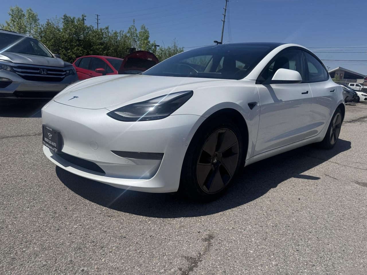 <html>
<p>2021 Tesla Model 3 comes in excellent condition,...LOW KILOMETRES,,CLEAN CARFAX REPORT,,,,Fully certified included in the price, HST & Licensing extra, Financing available with the lowest interest rates and affordable monthly payments............Please contact us @ 4 1 6 5 4 3 4 4 3 8 for more details....At Rideflex Auto we are serving our clients across G.T.A, Toronto, Vaughan, Richmond Hill, Newmarket, Bradford, Markham, Mississauga, Scarborough, Pickering, Ajax, Oakville, Hamilton, Brampton, Waterloo, Burlington, Aurora, Milton, Whitby, Kitchener London, Brantford, Barrie, Milton.......</p>
<p>Buy with confidence from Rideflex Auto... </p>
<br>
<br>
<br>
</html>