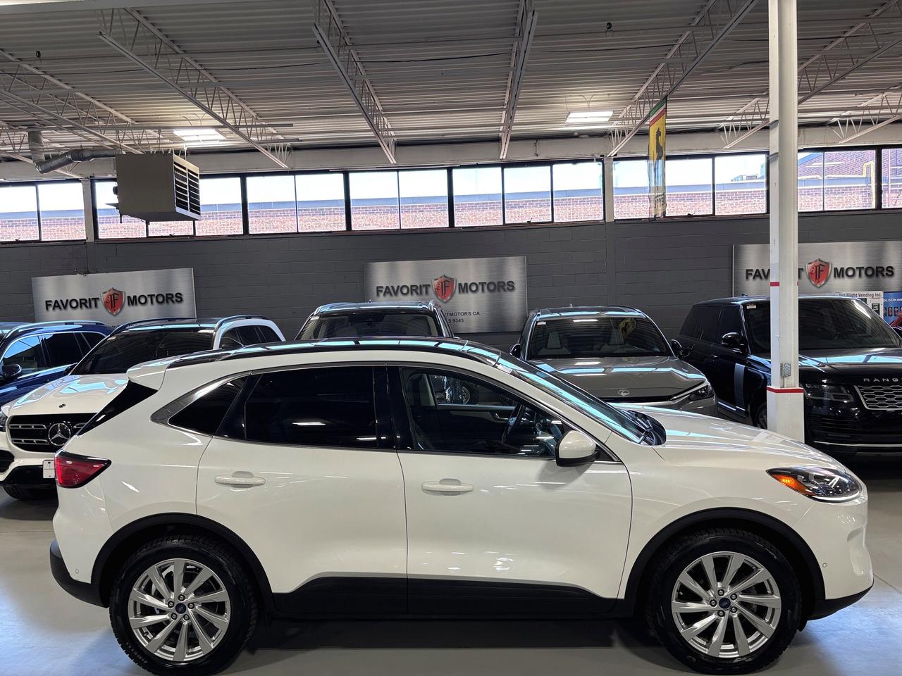 2021 Ford Escape Titanium Hybrid|AWD|NAV|CREAMLEATHER|WOOD|BOAUDIO| Photo