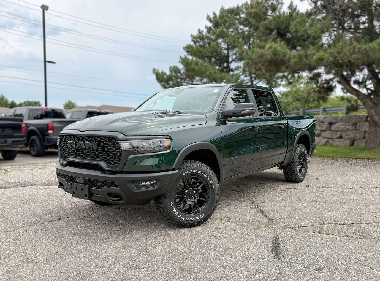 With rugged hardware and trail-tuned confidence, our New 2026 RAM 1500 Rebel Crew Cab 4X4, equipped with the Level 2 Equipment Package in Serrano Green Metallic dares you to push past your limits. Motivated by a Twin-TurboCharged 3.0 Litre Hurricane 6 Cylinder delivering 420hp to an 8 Speed Automatic transmission engineered for off-road domination. A raised ride height, performance shocks, and a shift-on-demand transfer case can take this Four Wheel Drive truck further down the trail, and it achieves approximately 9.8L/100km on the highway. Our fierce and stylish RAM features LED lighting, fog lamps, a sport performance hood, bold graphics, black alloy wheels, dual-panel sunroof, off-road fender flares, and robust skid plates. Our Rebel cabin is ready for rough terrain, thanks to its Level 2 Equipment Pack, which features heated/ventilated luxury leather front seats, eight-way power adjustment for the driver, heated rear seats, a heated-wrapped steering wheel, dual-zone automatic climate control, 12V/115V outlets, a power rear window, and remote start. Off-Road Info Pages enhance the infotainment system with Uconnect&reg; 5 14.4-inch touchscreen display, full-color navigation, WiFi compatibility, Android Auto&reg;/Apple CarPlay&reg;, Bluetooth&reg;, voice control, dual wireless charging, and a nineteen-speaker Harman Kardon&reg; audio sound system. For safetys sake, RAM supplies front/rear auto braking, blind-spot monitoring, adaptive cruise control, active lane management, trailer sway damping, hill-start assistance, and more. Committed to truck leadership, our 1500 Rebel is a compelling choice! Save this Page and Call for Availability. We Know You Will Enjoy Your Test Drive Towards Ownership!