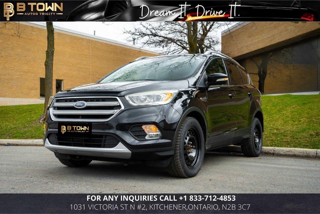 <span>Finished in </span><span>Black</span><span>, this </span><span>2017 Ford Escape Titanium AWD</span><span> offers the perfect blend of versatility, comfort, and turbocharged performance. As the top trim in the Escape lineup, the Titanium delivers premium features, advanced technology, and confident all-weather capability, making it an excellent choice for daily commuting or weekend adventures.</span>




<span>Powered by a </span><span>2.0L EcoBoost Turbocharged 4-Cylinder engine producing 245 horsepower</span><span>, paired with a </span><span>6-Speed Automatic Transmission</span><span> and </span><span>Intelligent All-Wheel Drive</span><span>, the Escape delivers responsive performance, excellent handling, and year-round confidence. With only </span><span>73,955 KM</span><span>, this well-maintained SUV is ready for its next owner.</span>




<strong>Key Features & Factory Options</strong>

<span>&bull; </span><span>2.0L EcoBoost Turbocharged 4-Cylinder &ndash; 245 HP</span><span>

&bull; 6-Speed Automatic Transmission

&bull; Intelligent All-Wheel Drive (AWD)

&bull; Titanium Package

&bull; Leather-Trimmed Seating

&bull; Heated Front Seats

&bull; Heated Steering Wheel

&bull; Power Driver&rsquo;s Seat with Memory

&bull; Panoramic Vista Roof

&bull; Hands-Free Power Liftgate

&bull; SYNC&reg; 3 Infotainment System

&bull; Apple CarPlay&reg; & Android Auto&trade;

&bull; Sony&reg; Premium Audio System

&bull; Navigation System

&bull; Remote Start System

&bull; Dual-Zone Automatic Climate Control

&bull; Blind Spot Information System (BLIS)

&bull; Rear Cross-Traffic Alert

&bull; Rear View Camera

&bull; Rear Parking Sensors

&bull; Keyless Entry with Push Button Start

&bull; 19-Inch Alloy Wheels</span>







<strong>At B-Town Auto Sales, each vehicle undergoes a comprehensive inspection to ensure exceptional quality and performance. We proudly serve customers across the Greater Toronto Area and beyond, offering competitive financing, trade-ins, and nationwide shipping.</strong>




<strong>$999* FINANCING FEES APPLY.</strong>




<strong>Special Financing price: $ *</strong>

<strong>Cash Price: $ *</strong>




<strong>Thank you for choosing B-Town Auto Sales.</strong>