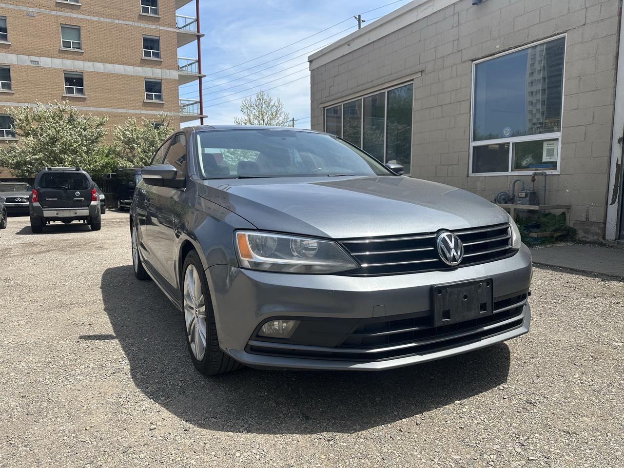 2015 Volkswagen Jetta 4dr 2.0 TDI DSG Highline Photo0