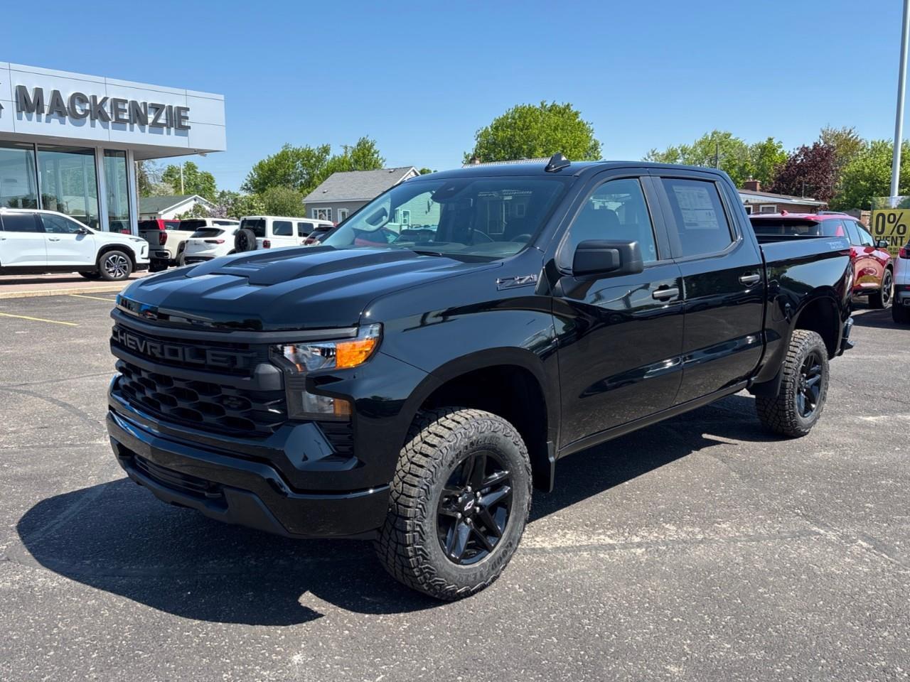 2026 Chevrolet Silverado 1500 Custom Trail Boss New 2026 Gas Powered V8 6 Passenger 4X4 Truck with Factory Installed 2 Lift, Spray-In Bedliner and a 7 Touchscreen Radio with Wireless Apple Carplay/Android Auto Photo