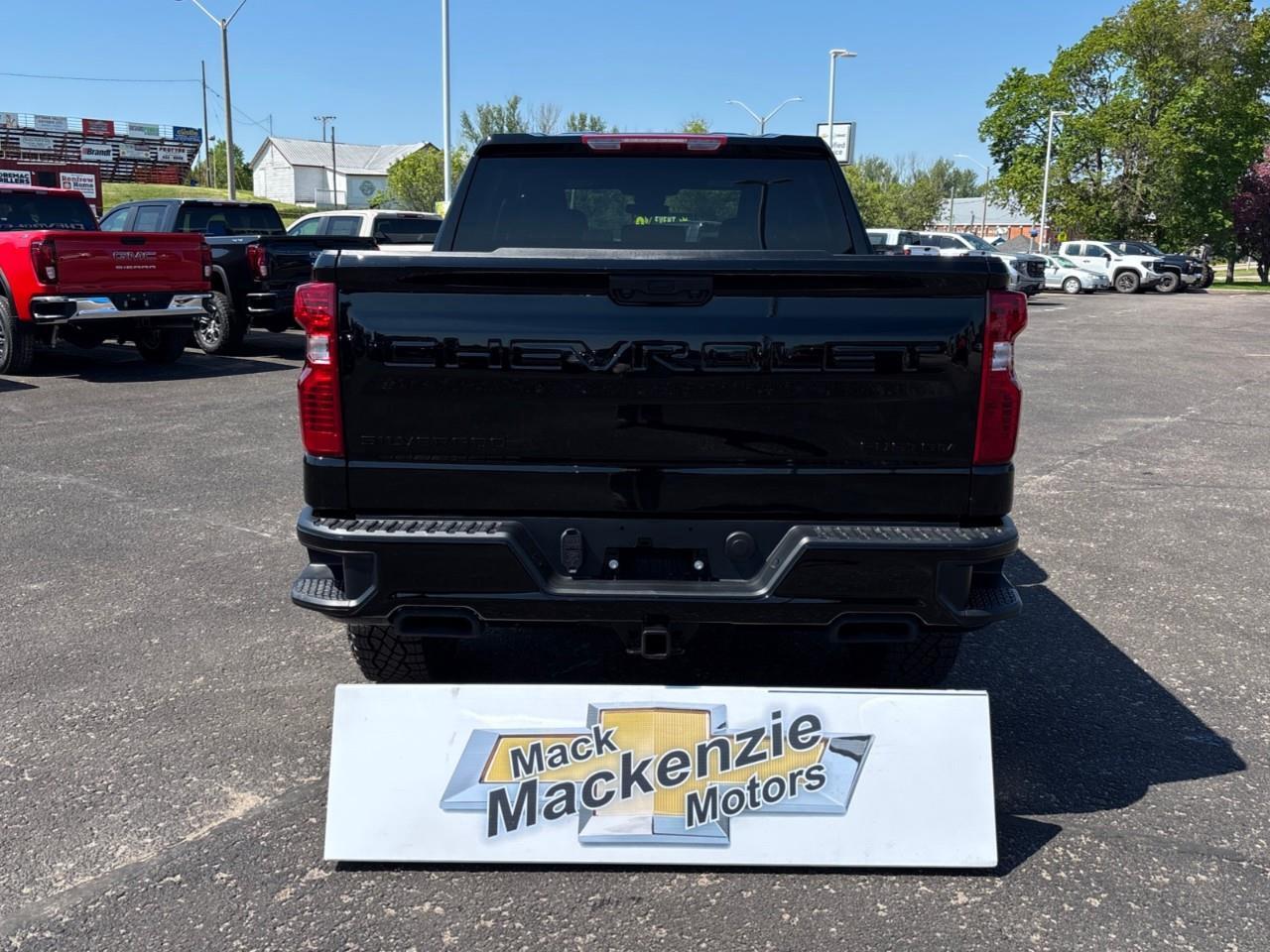 2026 Chevrolet Silverado 1500 Custom Trail Boss New 2026 Gas Powered V8 6 Passenger 4X4 Truck with Factory Installed 2 Lift, Spray-In Bedliner and a 7 Touchscreen Radio with Wireless Apple Carplay/Android Auto Photo