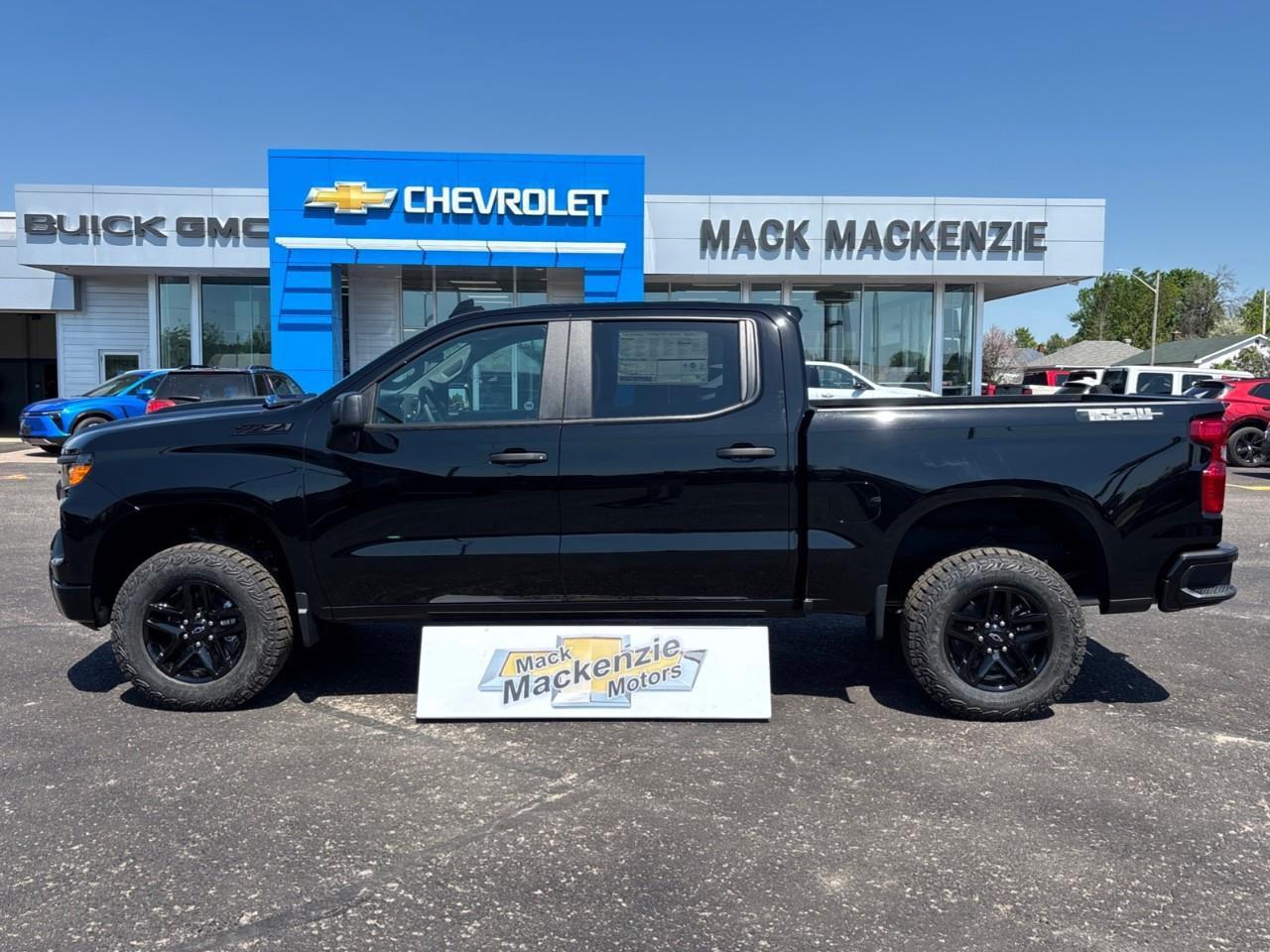 2026 Chevrolet Silverado 1500 Custom Trail Boss New 2026 Gas Powered V8 6 Passenger 4X4 Truck with Factory Installed 2 Lift, Spray-In Bedliner and a 7 Touchscreen Radio with Wireless Apple Carplay/Android Auto Photo