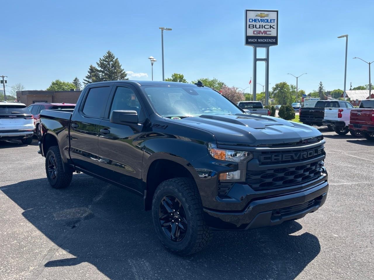 2026 Chevrolet Silverado 1500 Custom Trail Boss New 2026 Gas Powered V8 6 Passenger 4X4 Truck with Factory Installed 2 Lift, Spray-In Bedliner and a 7 Touchscreen Radio with Wireless Apple Carplay/Android Auto Photo