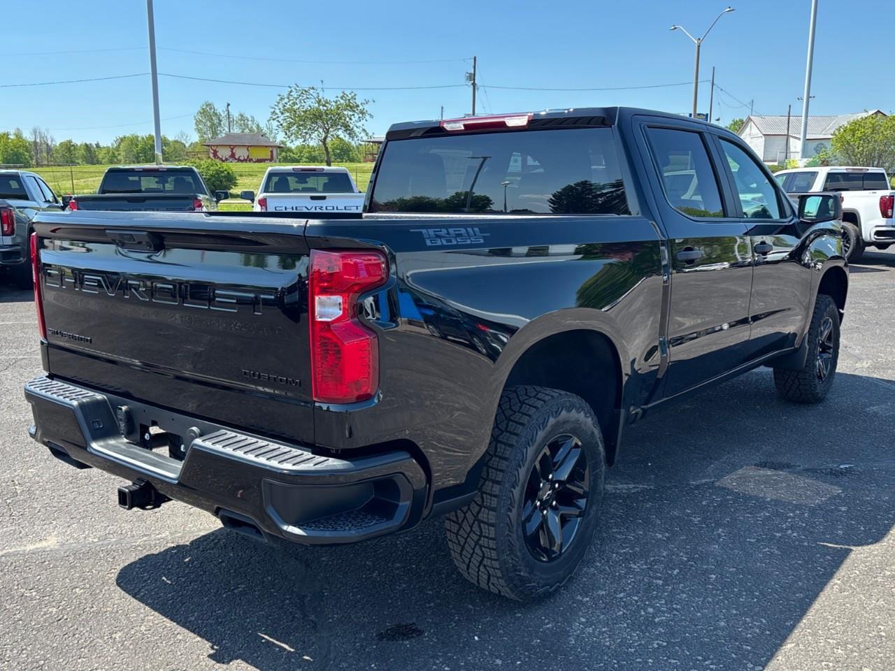 2026 Chevrolet Silverado 1500 Custom Trail Boss New 2026 Gas Powered V8 6 Passenger 4X4 Truck with Factory Installed 2 Lift, Spray-In Bedliner and a 7 Touchscreen Radio with Wireless Apple Carplay/Android Auto Photo