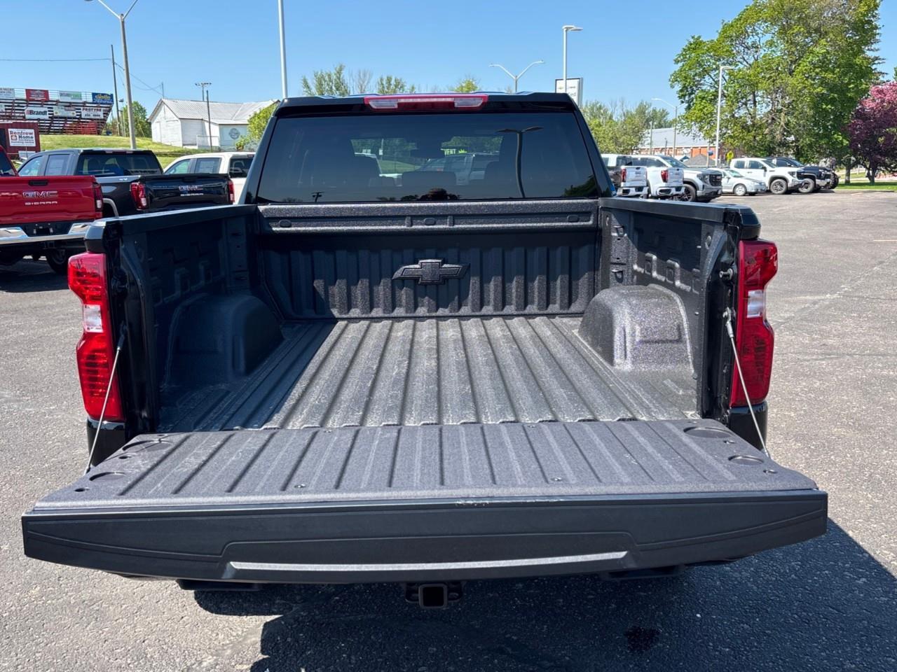 2026 Chevrolet Silverado 1500 Custom Trail Boss New 2026 Gas Powered V8 6 Passenger 4X4 Truck with Factory Installed 2 Lift, Spray-In Bedliner and a 7 Touchscreen Radio with Wireless Apple Carplay/Android Auto Photo