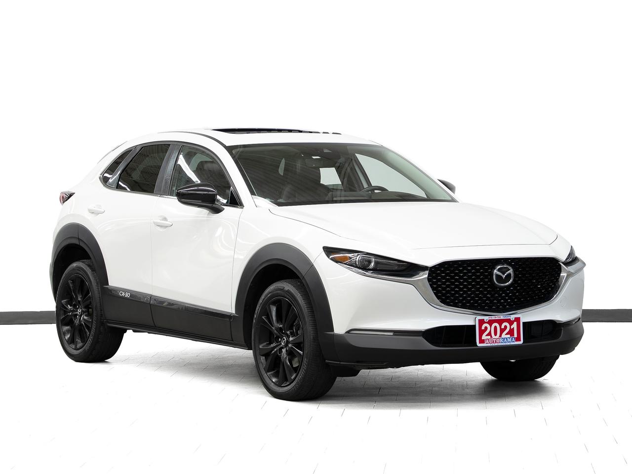 <div style=margin-bottom: 15px;><p data-path-to-node=1>Cash Price: $25,950 Finance Price: $23,950</p></div><div style=margin-bottom: 15px;><p data-path-to-node=2>Clean CarFax. 18-inch black alloy wheels | i-Activ All-Wheel Drive (AWD) | Power moonroof | Premium leather-trimmed upholstery | 10-way power-adjustable drivers seat with memory | Heated front seats | Heated steering wheel | 8.8-inch center display with Mazda Connect | Windshield-projected Active Driving Display (HUD) | 12-speaker Bose premium sound system | Apple CarPlay & Android Auto compatibility | i-Activsense safety suite | Mazda Radar Cruise Control with Stop & Go | Advanced Blind Spot Monitoring | Rear Cross Traffic Alert | Lane-keep Assist System | Smart Brake Support | Dual-zone automatic climate control | Advanced Keyless Entry with push-button start | Power liftgate | Rearview camera | Bluetooth connectivity. 2.5L Turbocharged 4-cylinder engine (250HP) with 6-speed automatic transmission. Smooth Eco Comfort. Extended warranty options available. Trades are welcome. Financing for all credit types. Same-day approval. 125-point inspection completed. Detailed from corner to corner. Over 250 high-quality used vehicles available at the lowest prices for you to choose from. All vehicles are indoors. Visit us rain or shine.</p></div><div style=margin-bottom: 15px;>Call us to book a test drive: <a href=tel:4167397262>416-739-7262</a><br>Get pre-approved for your car loan in a minute: <a href=https://www.autorama.ca/financing/>Apply for Used Car Financing</a><br>Visit our showroom: 1205 Finch Ave West, North York, ON M3J 2E8</div><div style=margin-top: 15px; margin-bottom: 15px;>&mdash;&mdash;&mdash;&mdash;&mdash;&mdash;&mdash;&mdash;&mdash;&mdash;&mdash;&mdash;&mdash;&mdash;&mdash;&mdash;&mdash;&mdash;&mdash;&mdash;&mdash;&mdash;&mdash;&mdash;&mdash;&mdash;&mdash;&mdash;</div><h3 style=margin-bottom: 5px; margin-top: 0;>Pricing&nbsp;</h3><div style=margin-bottom: 15px;>Best Priced Dealer Award Winner for consecutive years. No admin or hidden fees. Prices exclude HST and licensing. Although every effort is made to ensure accuracy, Autorama is not responsible for typographical errors, omissions, or changes. Please verify all details in person. <span style=text-decoration: underline;>All vehicles can be Certified for an additional $999</span>. If not Certified, as per OMVIC Regulations, the vehicle is deemed to be not drivable and not Certified. Special pricing is not available to commercial, dealer, or exporting purchasers.</div><div style=margin-top: 15px; margin-bottom: 15px;>&mdash;&mdash;&mdash;&mdash;&mdash;&mdash;&mdash;&mdash;&mdash;&mdash;&mdash;&mdash;&mdash;&mdash;&mdash;&mdash;&mdash;&mdash;&mdash;&mdash;&mdash;&mdash;&mdash;&mdash;&mdash;&mdash;&mdash;&mdash;</div><h3 style=margin-bottom: 5px; margin-top: 0;>Financing</h3><div style=margin-bottom: 15px;>We welcome all credit types (no credit, new to the country, bankruptcy, consumer proposal, collections, and others). We offer $0 down and no payment for up to 6 months on approved credits. Want to get started now? Apply for a <a href=https://www.autorama.ca/financing/?utm_source=vdpdesc&utm_medium=vdpdesc>car loan online</a>. Same-day auto finance approvals and same-day delivery are available for qualified customers. Financing programs are available for an additional $999. &nbsp;Our team works with a wide network of banks and lenders to help secure the best possible approval tailored to your situation.</div><div style=margin-top: 15px; margin-bottom: 15px;>&mdash;&mdash;&mdash;&mdash;&mdash;&mdash;&mdash;&mdash;&mdash;&mdash;&mdash;&mdash;&mdash;&mdash;&mdash;&mdash;&mdash;&mdash;&mdash;&mdash;&mdash;&mdash;&mdash;&mdash;&mdash;&mdash;&mdash;</div><h3 style=margin-bottom: 5px; margin-top: 0;>Vehicle Review</h3><div style=margin-bottom: 15px;><p data-path-to-node=12>The 2021 Mazda CX-30 GT Turbo is a premium subcompact crossover that perfectly blends elegant design with thrilling performance. As the top-tier GT Turbo trim, it stands out on the streets of the GTA with its sleek profile, gloss black front grille, and 18-inch black alloy wheels. Inside the beautifully crafted cabin, youll be treated to a power moonroof, rich leather seating surfaces, and a heated steering wheel paired with heated front seats for those cold Ontario winters. Staying connected is effortless with the 8.8-inch center display featuring Apple CarPlay and Android Auto, while the 12-speaker Bose premium audio system delivers concert-quality sound. Powered by a potent 2.5L turbocharged engine producing up to 250 horsepower and paired with Mazdas intelligent i-Activ All-Wheel Drive, the CX-30 Turbo offers an incredibly dynamic and confident driving experience. Complete with a Head-Up Display and the comprehensive i-Activsense safety suite, including Mazda Radar Cruise Control and Advanced Blind Spot Monitoring, this crossover is a remarkably sophisticated and exhilarating choice. We have a wide selection of used <a href=https://www.autorama.ca/vehicles?dsp_model=600187 target=_blank rel=noopener>Mazda CX-30</a> to help you choose.</p></div><div style=margin-top: 15px; margin-bottom: 15px;>&mdash;&mdash;&mdash;&mdash;&mdash;&mdash;&mdash;&mdash;&mdash;&mdash;&mdash;&mdash;&mdash;&mdash;&mdash;&mdash;&mdash;&mdash;&mdash;&mdash;&mdash;&mdash;&mdash;&mdash;&mdash;&mdash;&mdash;&mdash;</div><h3 style=margin-bottom: 5px; margin-top: 0;>Warranty</h3><div style=margin-bottom: 15px;>This vehicle qualifies for an extended warranty with a variety of terms and coverage options. Ask us anytime, we&rsquo;ll help you choose the plan that&rsquo;s right for you.</div><div style=margin-top: 15px; margin-bottom: 15px;>&mdash;&mdash;&mdash;&mdash;&mdash;&mdash;&mdash;&mdash;&mdash;&mdash;&mdash;&mdash;&mdash;&mdash;&mdash;&mdash;&mdash;&mdash;&mdash;&mdash;&mdash;&mdash;&mdash;&mdash;&mdash;&mdash;&mdash;&mdash;</div><h3 style=margin-bottom: 5px; margin-top: 0;>Trade-In / Appraisal</h3><div style=margin-bottom: 15px;>Have a vehicle to trade? We pay top dollar for trades, any vehicle, any condition. Bring your trade for a free appraisal when you visit us or you can apply for</div><div style=margin-top: 15px; margin-bottom: 15px;>&mdash;&mdash;&mdash;&mdash;&mdash; &mdash;&mdash;&mdash;&mdash;&mdash;&mdash;&mdash;&mdash;&mdash;&mdash;&mdash;&mdash;&mdash;&mdash;&mdash;&mdash;&mdash;&mdash;&mdash;&mdash;&mdash;&mdash;&mdash;</div><h3 style=margin-bottom: 5px; margin-top: 0;>Visit / Showroom Info</h3><div style=margin-bottom: 15px;>Visit our indoor showroom (rain or shine) at:<br>Autorama 1205 Finch Ave West, North York, ON M3J 2E8<br>Call us at <a href=tel:4167397262>416-739-7262</a> to book a test drive or ask questions.</div><div style=margin-top: 15px; margin-bottom: 15px;>&mdash;&mdash;&mdash;&mdash;&mdash;&mdash;&mdash;&mdash;&mdash;&mdash;&mdash;&mdash;&mdash;&mdash;&mdash;&mdash;&mdash;&mdash;&mdash;&mdash;&mdash;&mdash;&mdash;&mdash;&mdash;&mdash;&mdash;&mdash;</div><h3 style=margin-bottom: 5px; margin-top: 0;>Who we are</h3><div style=margin-bottom: 15px;>Autorama is Toronto&rsquo;s trusted, award-winning <a href=https://www.autorama.ca/?utm_source=vdpdesc&utm_medium=vdpdesc>used car dealership</a>, offering over 250 hand-picked vehicles at the lowest prices. We&rsquo;re committed to exceptional service and have proudly served Toronto, Mississauga, Brampton, and the GTA for over 25 years &mdash; and with our full indoor showroom, you can visit us rain or shine.</div><div style=margin-top: 15px; margin-bottom: 15px;>&mdash;&mdash;&mdash;&mdash;&mdash;&mdash;&mdash;&mdash;&mdash;&mdash;&mdash;&mdash;&mdash;&mdash;&mdash;&mdash;&mdash;&mdash;&mdash;&mdash;&mdash;&mdash;&mdash;&mdash;&mdash;&mdash;&mdash;&mdash;</div><h3 style=margin-bottom: 5px; margin-top: 0;>Disclaimers</h3><ul style=margin-top: 0; padding-left: 20px;><li><span data-olk-copy-source=MessageBody>Prices exclude HST and licensing.</span></li></ul><ul style=margin-top: 0; padding-left: 20px;><li data-ogsc= data-olk-copy-source=MessageBody>Prices, rates, and payments are subject to change without notice.</li></ul><ul style=margin-top: 0; padding-left: 20px;><li data-ogsc= data-olk-copy-source=MessageBody>Advertised price includes a $2,000 finance credit. Cash price may differ.</li></ul><ul style=margin-top: 0; padding-left: 20px;><li data-ogsc= data-olk-copy-source=MessageBody>All vehicles come standard with one key. Additional keys may be purchased at the time of sale.</li></ul><ul style=margin-top: 0; padding-left: 20px;><li><span data-olk-copy-source=MessageBody>Although every effort is made to ensure accuracy, Autorama is not responsible for typographical errors, omissions, or changes. Please verify all details with your Sales & Finance Specialist.</span></li></ul>