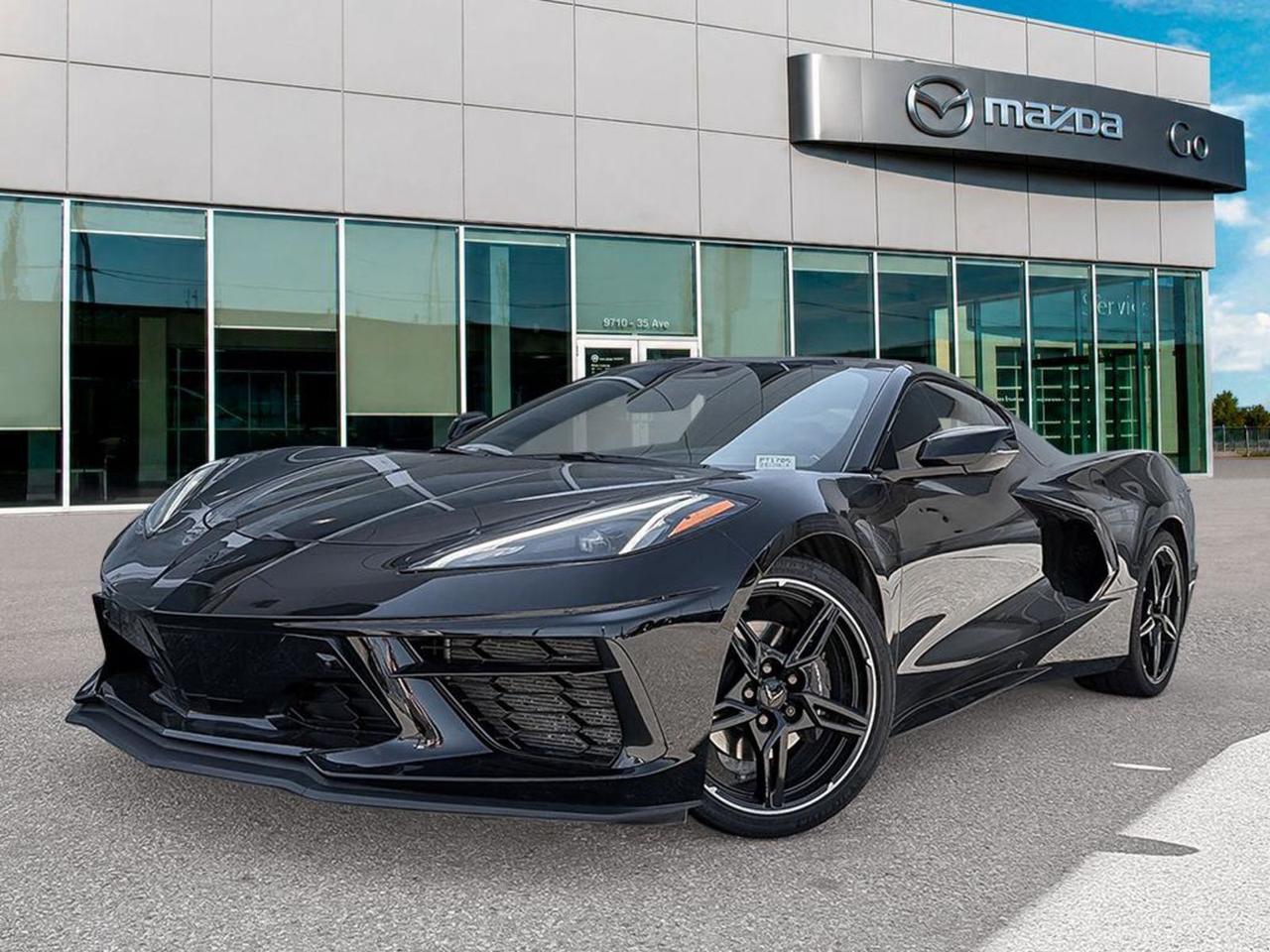 Experience the thrill of pure performance with this pre-owned 2024 Chevrolet Corvette 2LT Stingray Coupe in sleek Black. Powered by a 6.2L V8 engine and paired with an 8-speed dual-clutch transmission, it delivers exhilarating speed and precision handling. Enjoy premium comfort with Mulan leather GT1 bucket seats featuring heating and ventilation, advanced tech like the Bose 14-speaker sound system, Head-Up Display, and an intuitive Chevy Infotainment 3 system. Safety is top-notch with Rear Cross Traffic Alert and Blind Spot Monitoring. With its aggressive styling and cutting-edge features, this Corvette 2LT is the ultimate sports car for an unforgettable drive. Come see it today and ignite your passion for driving!Go Mazda is a AMVIC licenced businessClean CarFax