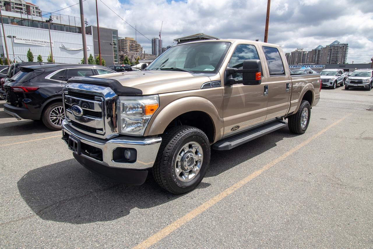 2011 Ford F-250 4WD Crew Cab 156" XLT Photo1