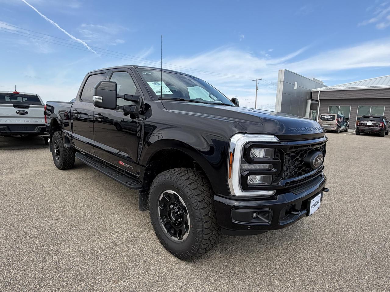 The 2026 Ford Super Duty F-350 LARIAT at Merit Ford Sales is purpose-built for those who demand more from their truck. Equipped with the legendary 6.7L High Output Power Stroke Diesel V8, the Tremor Off-Road Package, and a long list of work-ready upgrades, this rig is ready for heavy hauling, tough terrain, and everything in between  right out of the gate with only 12 km on the odometer.

- 6.7L High Output Power Stroke V8 Diesel engine paired with a smooth automatic transmission and part-time 4WD for serious towing and off-road capability
- Tremor Off-Road Package (17Y) adds specialized suspension tuning, skid plates, and off-road hardware for tackling rough terrain with confidence
- Black Appearance Package (17L) gives this LARIAT a blacked-out, aggressive look complementing the Agate Black Metallic exterior
- 5th Wheel/Gooseneck Hitch Prep Package (53W) makes this truck a natural for heavy trailer work  horses, equipment, or flatbeds
- 410 Amp Dual Alternators (67B) and Dual AGM 68 Ah Battery (86M) keep power-hungry accessories and upfitter equipment running without issue
- 6 Upfitter Switches (66S) allow easy integration of work lights, pumps, winches, or any auxiliary equipment
- LARIAT Premium Package (96W) brings elevated interior comfort and technology to a truck built for hard use
- Ford Connectivity Pack (94D) included with a 7-year one-time purchase for seamless connectivity on the job and on the road

Ready to put this F-350 to work for you? Visit Merit Ford Sales to book a test drive, reserve this truck online, or contact our team with any questions. Stock moves fast on purpose-built units like this  dont wait.