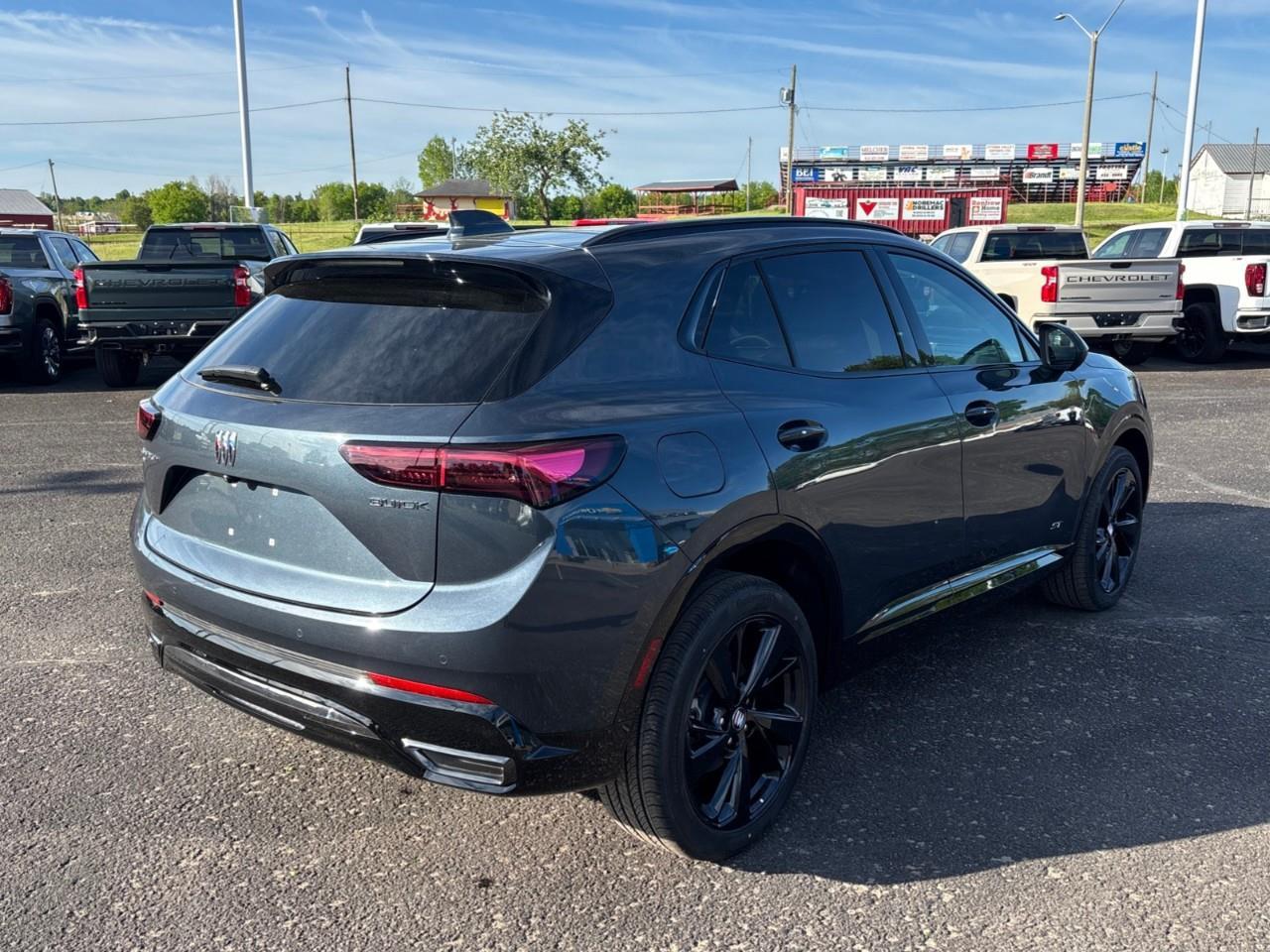 2026 Buick Envision Sport Touring New 2026 5 Passenger AWD SUV with Panoramic Sunroof, Heated Front Seats, Heated Steering Wheel, Heated Second Row Outboard Seats, Heads-Up Display, 30 Ultra-Wide Diagonal Screen, Adaptive Cruise Contr Photo