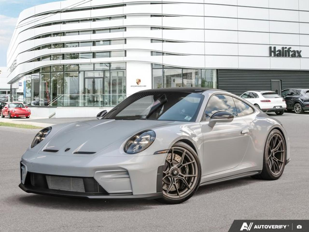This 2026 Porsche 911 GT3 with Touring Package, now available at Porsche Of Halifax, is finished in Ice Grey Metallic with a Leather Interior in Black with fabric seat centers and is equipped with a 6-speed GT Sport manual transmission.Powertrain and Drivetrain4.0-litre naturally aspirated flat-6 engine producing 502 horsepower and 331 lb-ft of torque6-speed GT Sport manual transmissionRear-wheel driveExteriorIce Grey MetallicTouring Package in BlackCarbon Fiber RoofProtection Film -- FrontFront fascia airblades in exterior colorExterior mirror upper trims in carbon fiberHD-Matrix Design LED Headlights in BlackExclusive Design taillightsWheels painted in Satin Dark SilverExclusive Design fuel capFront axle lift systemExtended range fuel tank (22.1 gallons)Brake calipers in High Gloss BlackUnder door puddle light projectorsInterior and SeatingLeather Interior in Black with fabric seat centersAdaptive Sport Seats Plus (18-way)Rear seatsSeat belts in Silver GreyDeviated stitching interior package in Arctic BlueInterior trim in Black with inlays in matte carbon fiberExtended leather package in Arctic BlueSeat consoles in leather -- Arctic BlueChrono stopwatch dial and digital tachometer in Arctic BlueCarbon fiber floor mats with leather edging -- Arctic BlueDoor-sill guards in matte carbon fiber, illuminatedStorage net in passenger footwellTechnology and Driver AssistanceBOSE® Surround Sound SystemChrono PackageParkAssist (rear)Preparation for Porsche Dashcam (front and rear)Ambient lightingThis 911 GT3 with Touring Package is configured with a naturally aspirated motorsport-derived powertrain, lightweight carbon fiber elements, and extensive Porsche Exclusive Manufaktur interior customization.Visit www.porscheofhalifax.com or call (902)453-8800 to speak with a Porsche Sales Executive.