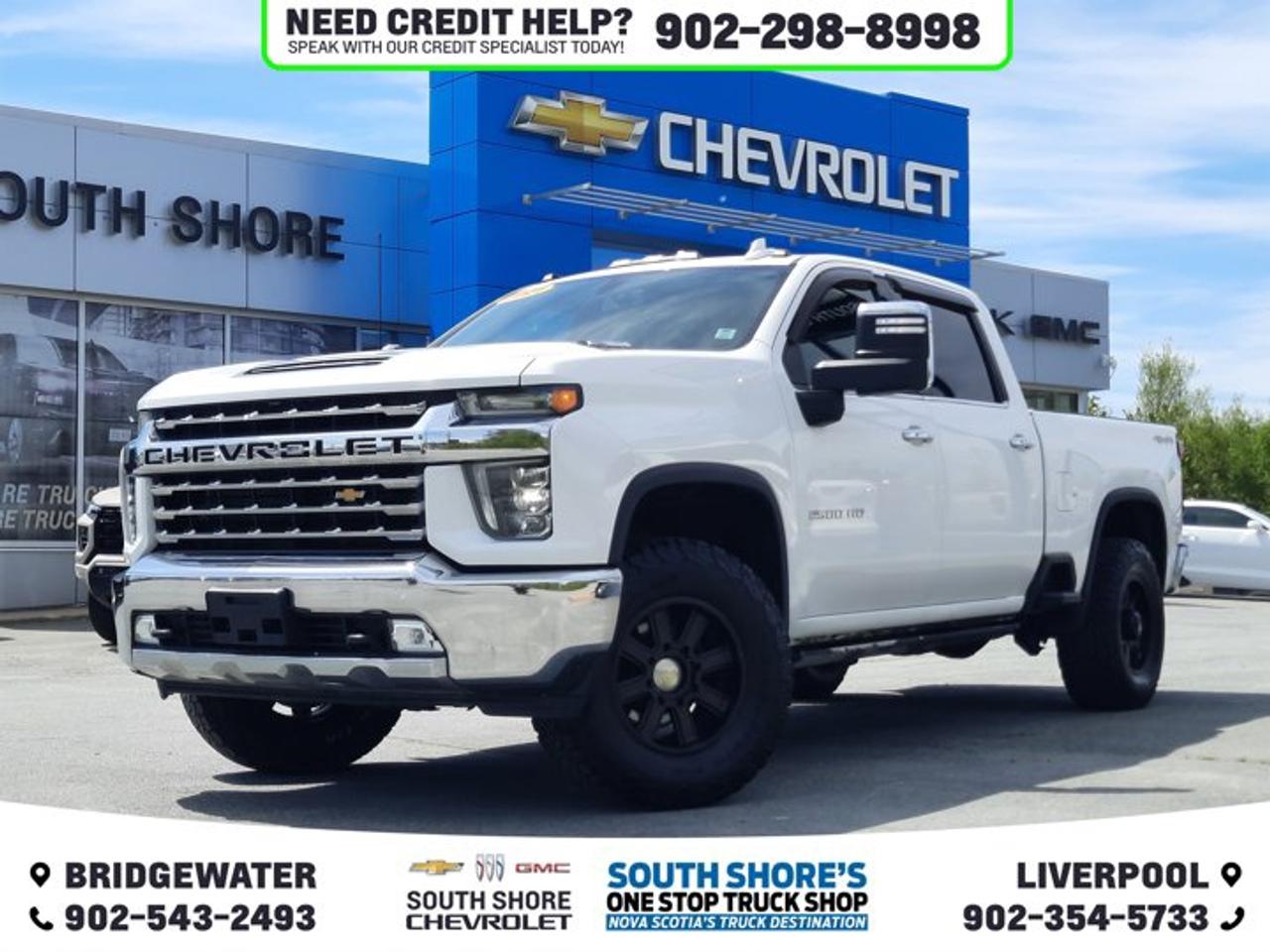 New Price! Summit White 2021 Chevrolet Silverado 2500HD LTZ 4WD 10-Speed Automatic Duramax 6.6L V8 Turbodiesel 10-Speed Automatic, 4WD, Leather, 120-Volt Bed Mounted Power Outlet, 120-Volt Instrument Panel Power Outlet, 220 Amp Alternator, 6 Speakers, 6-Speaker Audio System, AM/FM radio: SiriusXM with 360L, Auto-dimming door mirrors, Auto-dimming Rear-View mirror, Automatic temperature control, Black Beltline Mouldings, Bumpers: chrome, Chrome Mirror Caps, Electronic Cruise Control w/Set & Resume Speed, Front dual zone A/C, Heated front seats, Integrated Trailer Brake Controller, Perf Leather-Appointed Front Outboard Seat Trim, Security system, SiriusXM w/360L, Split folding rear seat, Turn signal indicator mirrors, Unauthorized Entry Theft-Deterrent System, Wheels: 18 Machined Alum w/Silver Painted Accents.