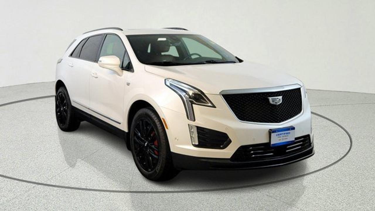 The 2022 Cadillac XT5 AWD Sport combines bold styling with confident all-wheel-drive performance, making it a refined and capable luxury SUV for all seasons. Its Sport trim features a powerful 3.6L V6 engine, adaptive suspension, Brembo performance brakes, and distinctive gloss-black exterior accents for a more athletic driving experience. Inside, the XT5 AWD Sport offers premium comfort with leather seating, advanced infotainment technology, a panoramic sunroof, and a full suite of driver-assistance features designed to enhance safety and convenience.