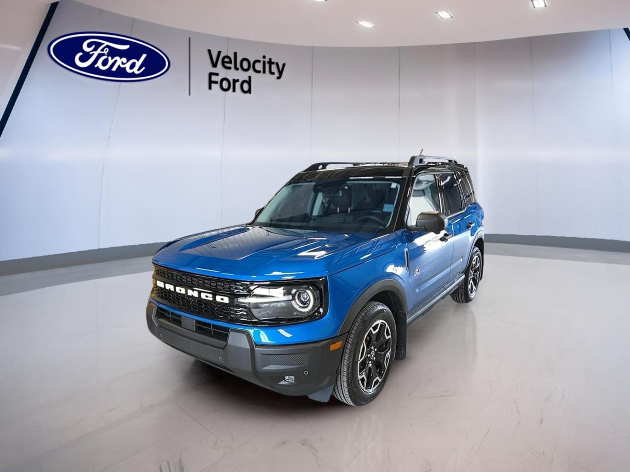 Discover the new 2026 Ford Bronco Sport Outer Banks 4x4 at Velocity Ford in Moose Jaw. This brand new SUV blends everyday comfort with true utility. Its blue exterior and black interior give it a clean, modern look, while four doors and automatic transmission make daily driving easy.

Built for Canadian roads and changing weather, the 2026 Ford Bronco Sport Outer Banks 4x4 offers confident four-wheel drive capability and a practical size that fits city streets and weekend plans. Its 1.5-litre unleaded engine delivers smooth power, making this SUV a smart fit for work, family, and travel.

FEATURES OF THE Bronco Sport Outer Banks 4x4

»» Blue exterior with bold SUV presence
»» Four-wheel drive for added traction
»» Eight-speed automatic for smooth shifting
»» Brand new condition for fresh ownership

ADVANCED SAFETY FEATURES

»» Anti-lock braking system helps maintain control
»» Stability control supports confident road handling
»» Blind spot monitor aids lane awareness
»» Backup camera helps with reversing safety

PERFORMANCE AND EFFICIENCY

»» 1.5-litre unleaded engine balances power efficiently
»» Eight-speed automatic supports smooth acceleration
»» Four-wheel drive adds year-round confidence
»» Power steering helps easy low-speed manoeuvres

COMFORT AND CONVENIENCE

»» Heated front seats add winter comfort
»» Dual-zone climate control improves cabin comfort
»» Remote starter helps on cold mornings
»» Memory seat settings add daily ease

TECHNOLOGY AND CONNECTIVITY

»» Bluetooth integration supports hands-free communication
»» Wi-Fi hotspot keeps devices connected
»» Steering wheel audio controls add convenience
»» Satellite radio expands entertainment choices

CARGO SPACE

»» Rear trunk access simplifies daily loading
»» Four-door layout improves passenger entry
»» Flexible cabin suits errands and travel
»» Practical SUV design supports active lifestyles

WHAT OTHER OWNERS LIKE

»» Easy-to-drive size with useful versatility
»» Comfortable ride for daily commuting
»» Helpful driver assistance builds confidence
»» Heated features suit Canadian winters

This new 2026 Ford Bronco Sport Outer Banks 4x4 is equipped with a strong list of useful features that make every trip more enjoyable. You get heated mirrors, electric mirrors, power windows, front air conditioning, tinted windows, fog lights, LED headlamps, rear window defroster, push button start, and automatic headlights for everyday convenience.

Inside, the 2026 Ford Bronco Sport Outer Banks 4x4 is designed to keep the driver comfortable and in control. It includes an adjustable steering wheel, drivers seat lumbar support, drivers side power seat, electric passenger seat, memory mirrors, auto-dimming rearview mirror, illuminated vanity mirrors, and ambient lighting package for a refined cabin feel.

Safety remains a key strength in this 2026 Ford Bronco Sport Outer Banks 4x4. It comes with driver airbag, passenger airbag, passenger airbag sensor, side impact airbags, head side airbags, child safety locks, lane departure warning, tire pressure monitoring, and automatic door locks. This SUV is ready to support peace of mind on every drive.

This 2026 Ford Bronco Sport Outer Banks 4x4s VIN is: 3FMCR9CNXTRE51032.