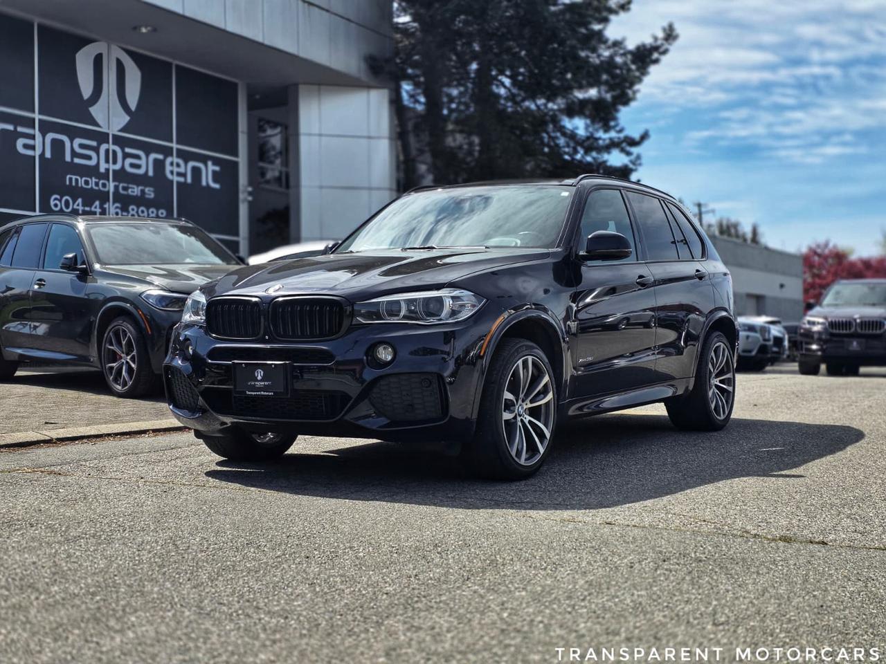 Transparent Motorcars is pleased to offer this beautiful 2015 BMW X5 xDrive 35i with 144,767kms! It Features 300 Horsepower Turbocharged Engine Paired With 8-Speed Shiftable Automatic Transmission Layered With All-Wheel-Drive System, M SPORT LINE, PREMIUM PACKAGE, Backup Camera, Multi-Zone Climate Control, Keyless Start/Entry, Universal Garage Door Opener, Aerial View Display System, DRIVER ASSISTANCE PACKAGE, Blind Spot Monitoring, Lane Departure Warning, Driver Monitoring, Front Collision Mitigation, Navigation System, M Sport Aluminum Wheels, HARMAN/KARDON Premium Sound System And Much More! <br/> <br/> <br/> <br/> <br/> <br/> <br/> Stock# G00293B Dealer # 50276 <br/> <br/> <br/> $995 Documentation Fee <br/> <br/> <br/> <br/> <br/> 3771 No.3 Road, Richmond/4211 No.3 Road, Richmond <br/> <br/> <br/> <br/> <br/> <br/> <br/> This vehicle has undergone a comprehensive 110-point inspection at our state-of-the-art service facility, covering: Powertrain, Suspension, Tire Tread Depth,Brake Condition, and all electrical components <br/> <br/> <br/> <br/> <br/> *Each vehicle comes with a limited warranty for your peace of mind. <br/> <br/> <br/> <br/> <br/> *Free, full CARFAX Vehicle History Report available upon request. <br/> <br/> <br/> <br/> <br/> *We are a 5-star-rated Google dealership, trusted by our customers. <br/> <br/> <br/> <br/> <br/> *Thousands of satisfied customers  we invite you to join our automotive family! <br/> <br/> <br/> <br/> <br/> *Complimentary pick-up service from the airport, ferry terminal, or SkyTrain station is available. <br/> <br/> <br/> <br/> <br/> *For details on our refund and buyback policy, please get in touch with our team directly. <br/> <br/> <br/> <br/> <br/> <br/> <br/> At our dealership, we take pride in building lasting relationships with our customers. Were not just a one-time dealer  we are committed to being your trusted partner for all your vehicle needs, now and in the future. From your initial purchase to ongoing service, we aim to exceed expectations every step of the way. <br/>