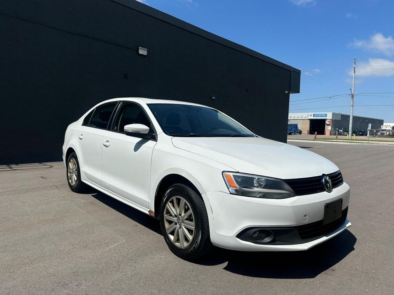 2014 Volkswagen Jetta Sedan 4dr 2.0L Auto Comfortline Photo