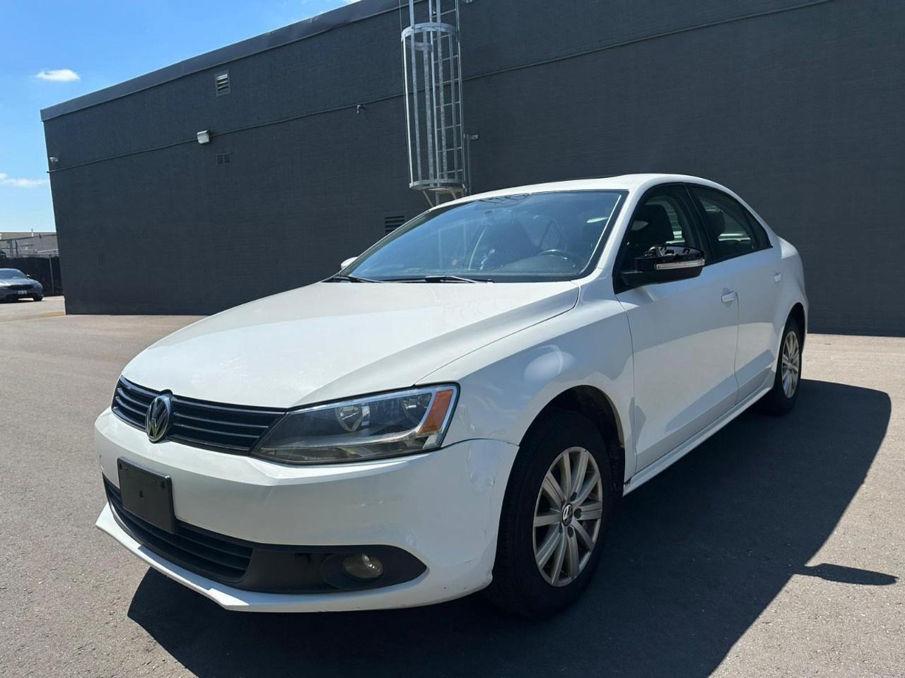 2014 Volkswagen Jetta Sedan 4dr 2.0L Auto Comfortline Photo