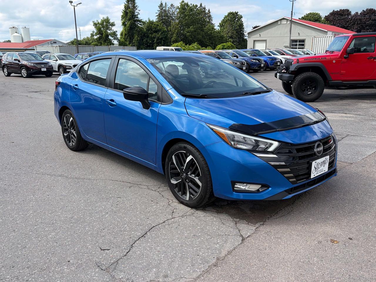 2023 Nissan Versa SR/HEATED SEATS/BACK UP CAM/CALL BELLEVILLE Photo